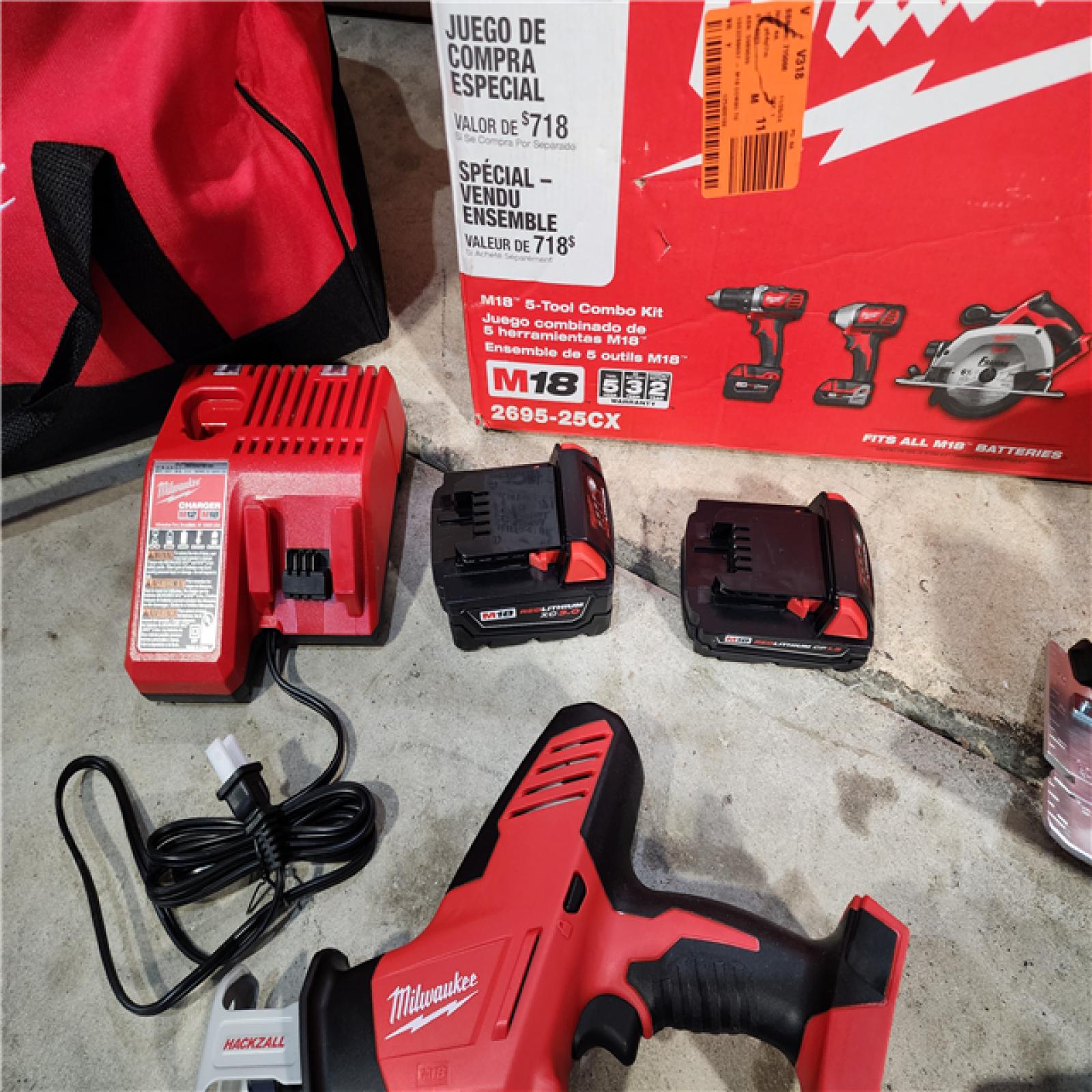 HOUSTON LOCATION - AS-IS (APPEARS LIKE NEW) Milwaukee M18 18-Volt Lithium-Ion Cordless Combo Tool Kit (5-Tool) with (1) 3.0Ah and (1) 1.5Ah Battery, (1) Charger, (1) Tool Bag