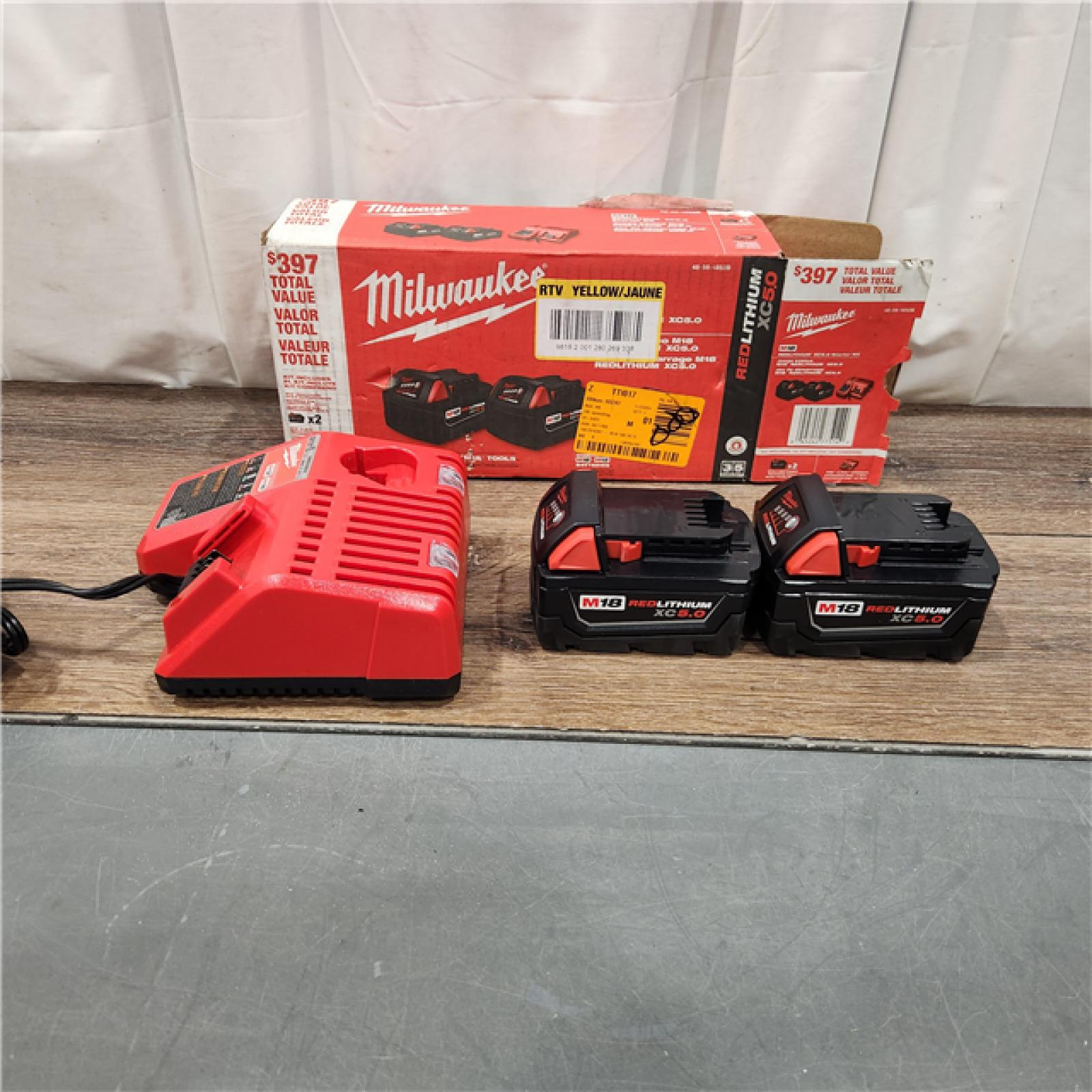 AS IS M18 18-Volt Lithium-Ion XC Starter Kit with Two 5.0Ah Batteries and Charger