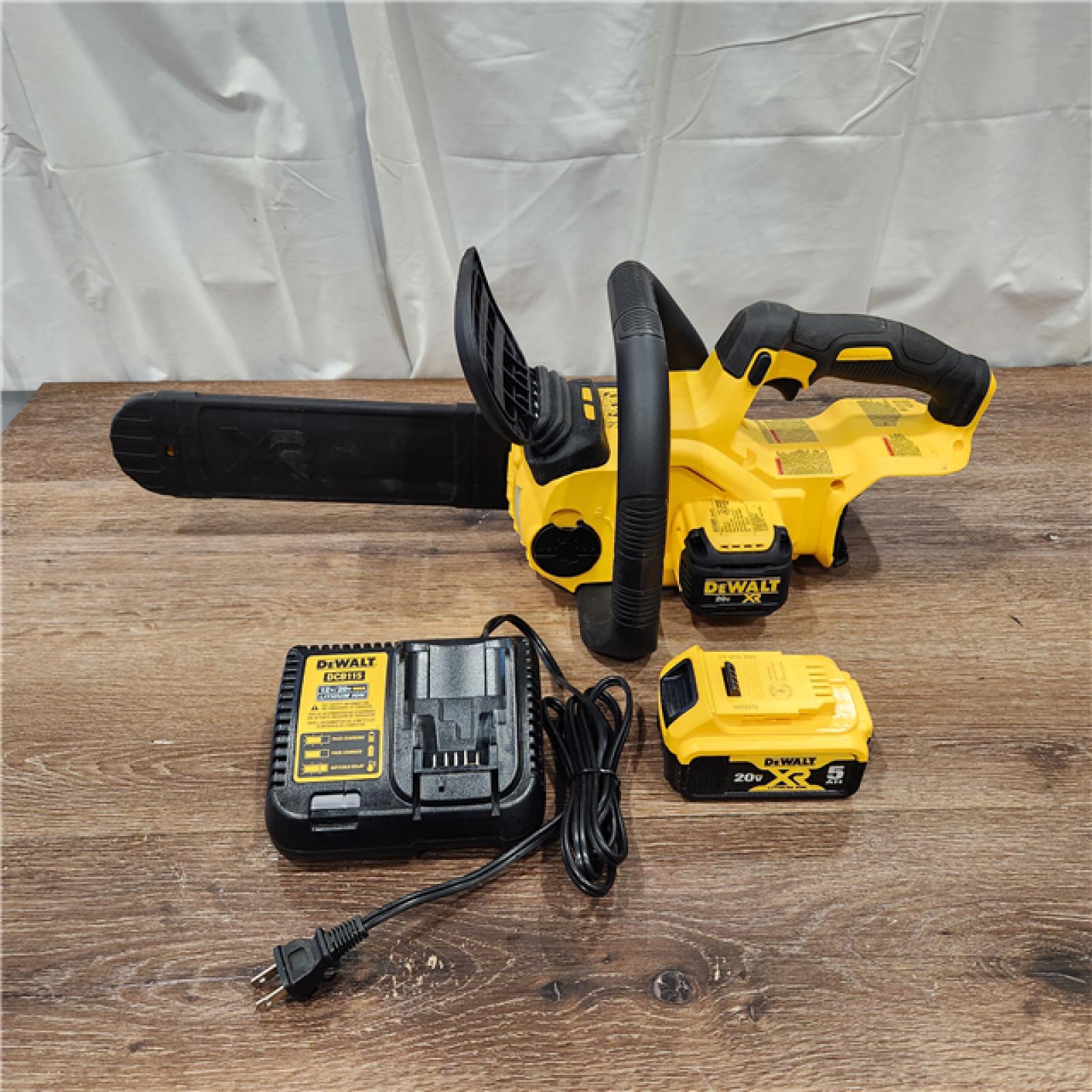 AS-IS Dewalt 7605686 12 in. 20V Battery Powered Chainsaw