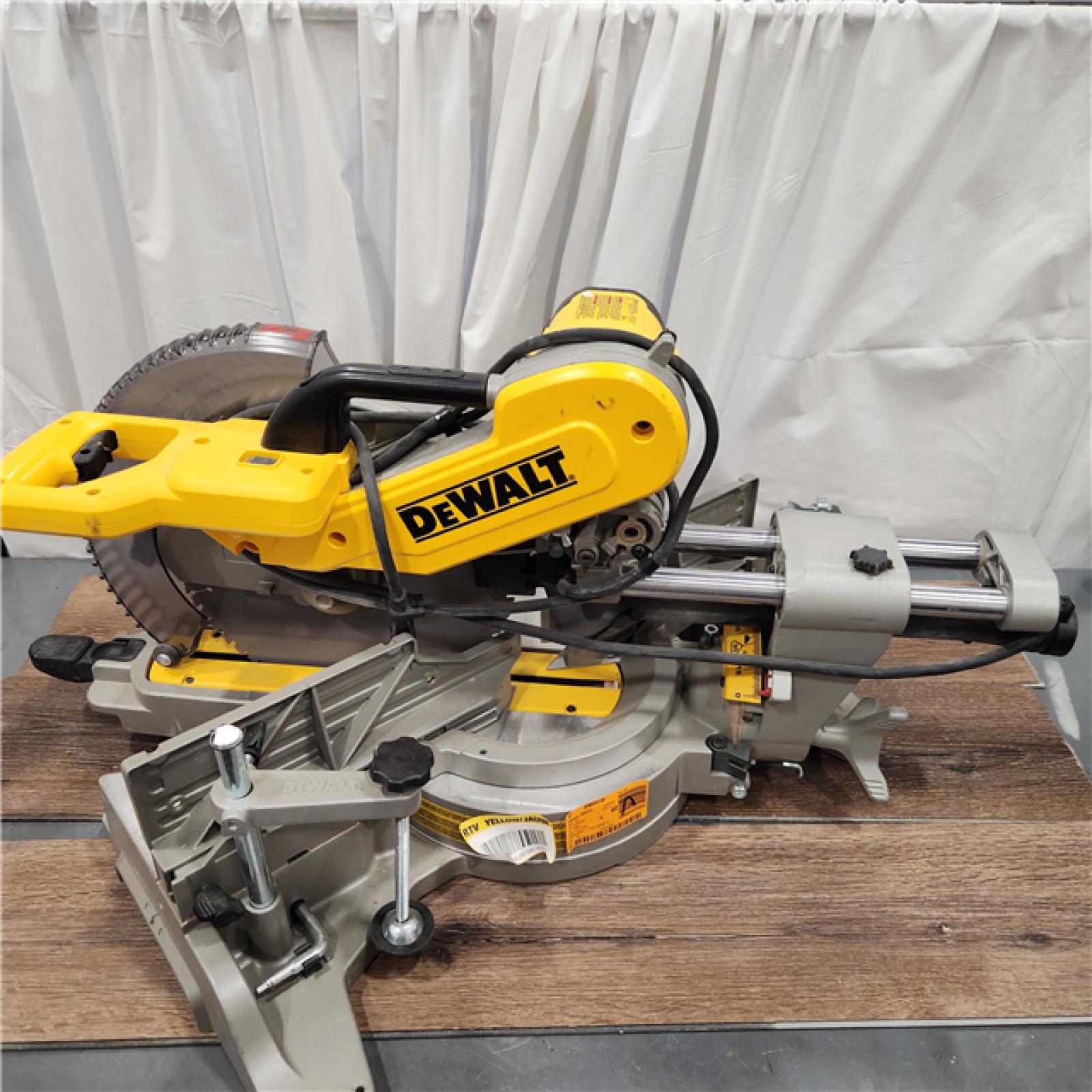 AS-IS DEWALT 15 Amp Corded 12 in. Double Bevel Sliding Compound Miter Saw with XPS Technology, Blade Wrench and Material Clamp