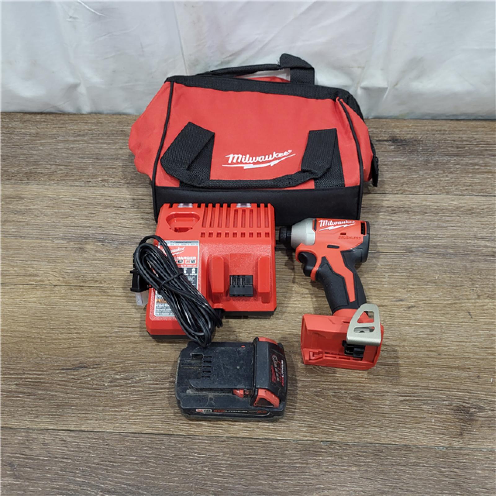 AS-IS Milwaukee M18 Compact Brushless 1/4  Hex Impact Driver Kit