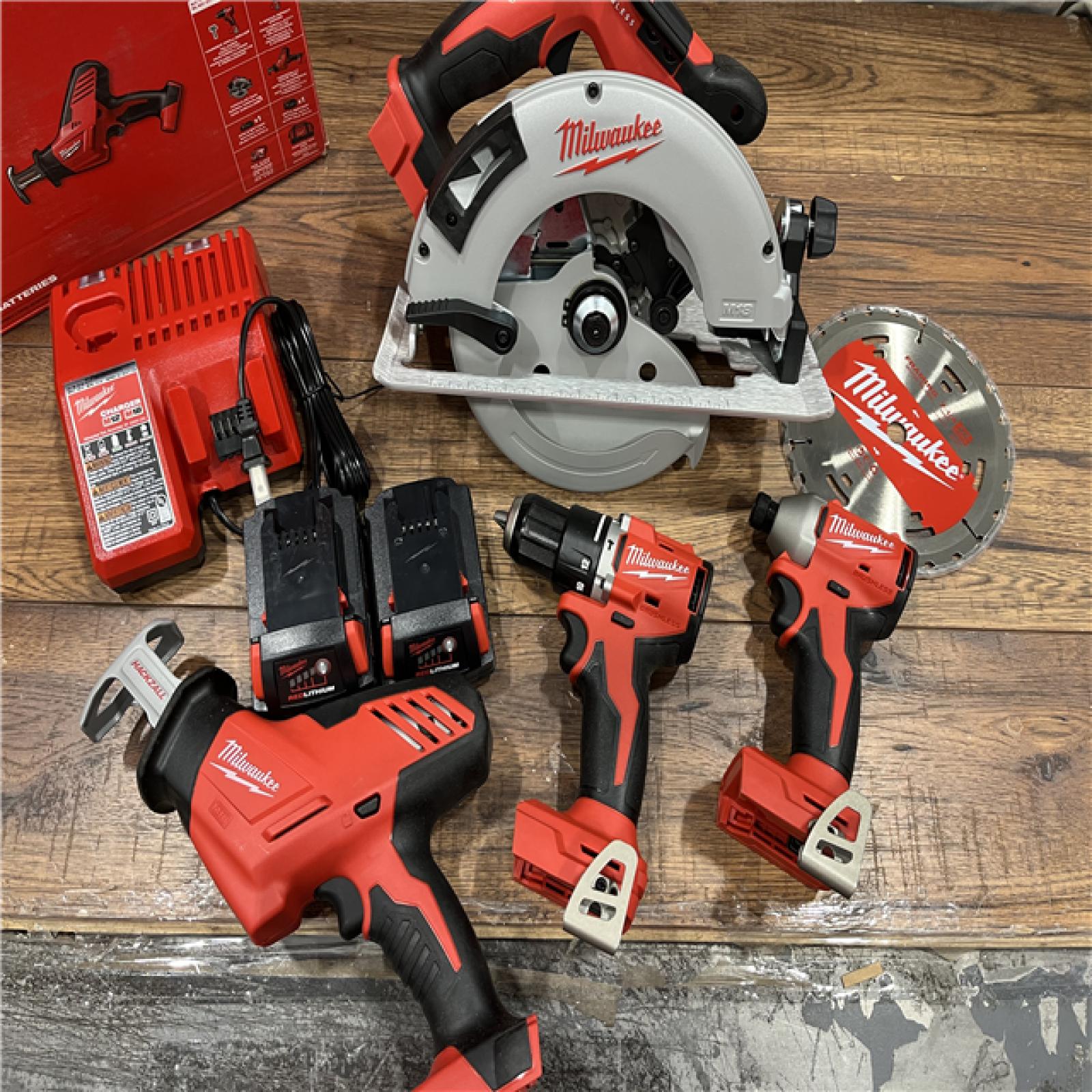 AS-IS Milwaukee M18 18-Volt Lithium-Ion Brushless Cordless Combo Kit (4-Tool) with 2-Batteries, 1-Charger and Tool Bag