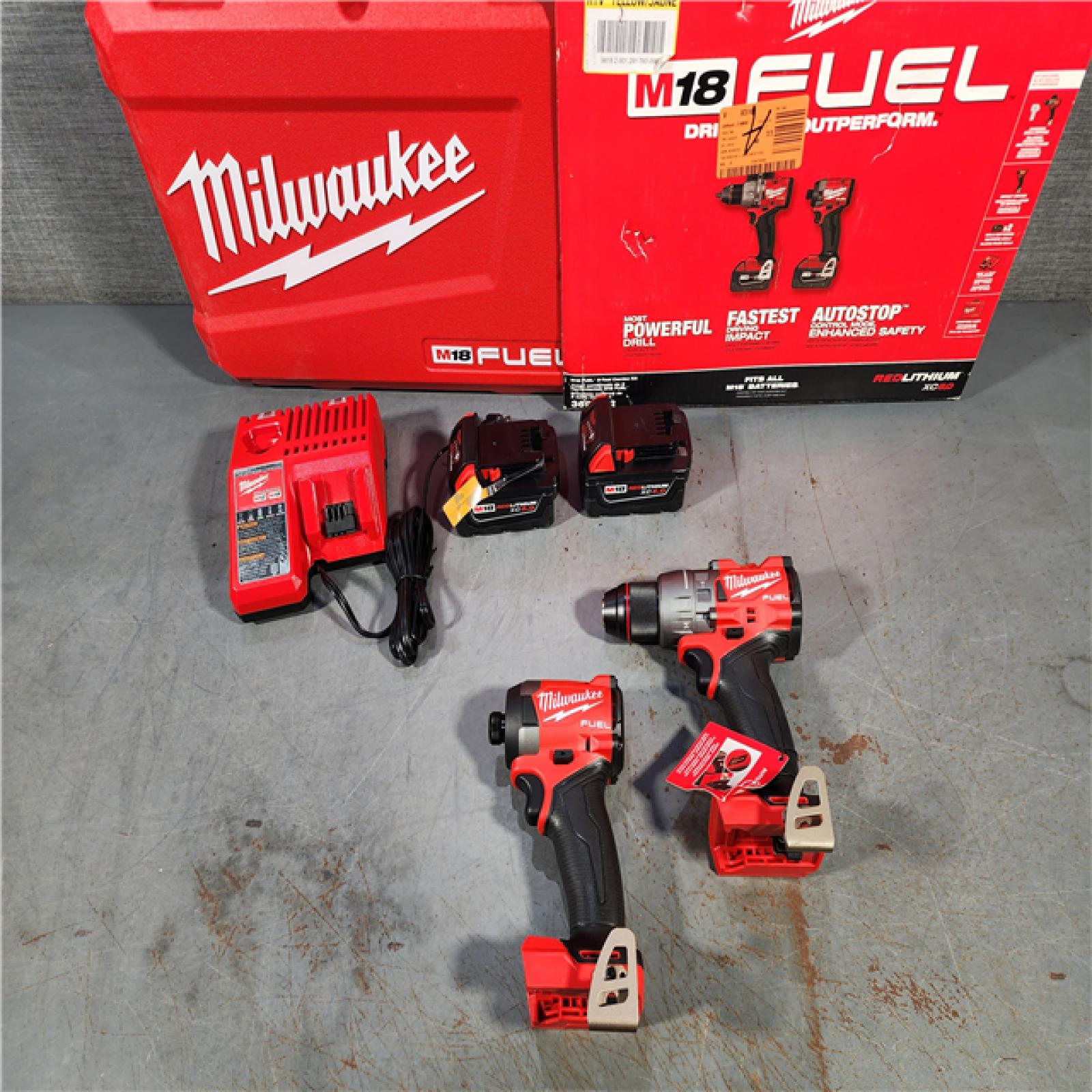 HOUSTON LOCATION - AS-IS (APPEARS LIKE NEW) Milwaukee M18 FUEL 18V Lithium-Ion Brushless Cordless Hammer Drill and Impact Driver Combo Kit (2-Tool) with 2 Batteries