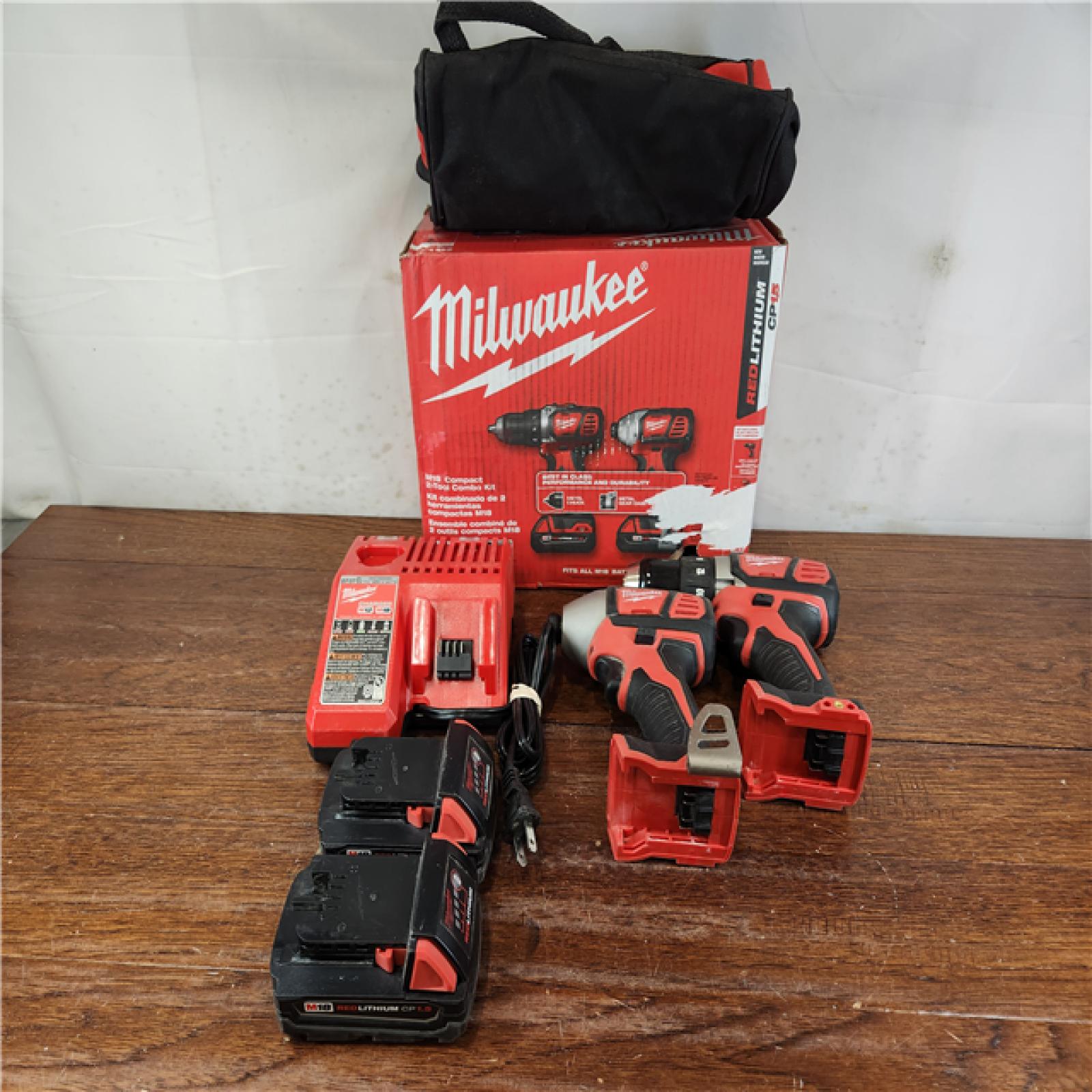 AS-IS Milwaukee M18 Brushed Cordless (2-Tool) Drill/Driver and Impact Driver Kit