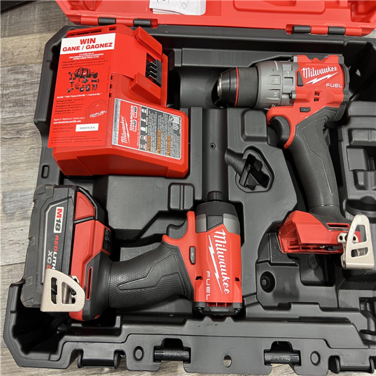 AS-IS MILWAUKEE M18 FUEL 18V Lithium-Ion Brushless Cordless Hammer Drill and Impact Driver Combo Kit (2-Tool) with 2 Batteries