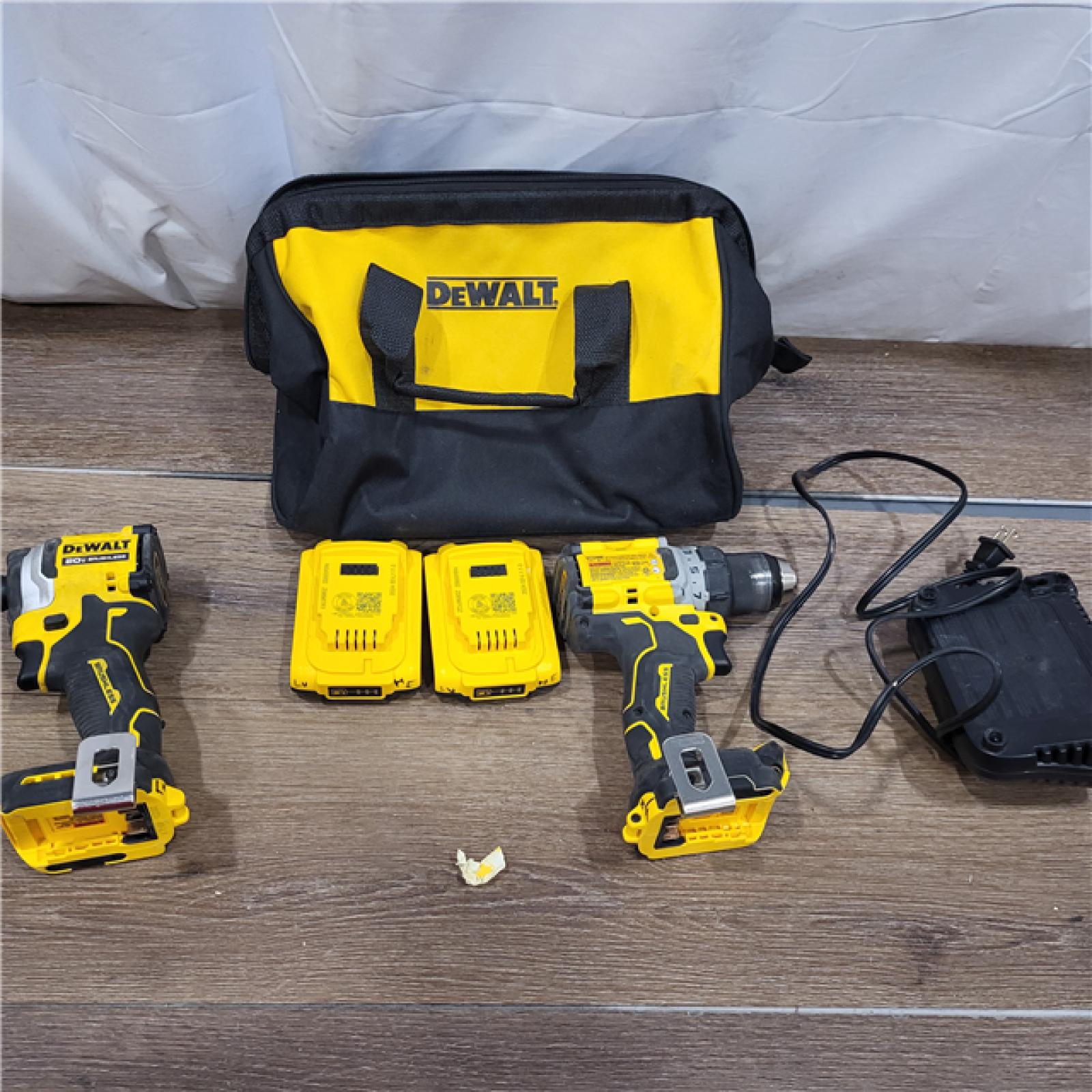 AS-IS DEWALT 20V MAX XR Cordless Drill/Driver, ATOMIC Impact Driver 2 Tool Combo Kit, (2) 2.0Ah Batteries, Charger, and Bag