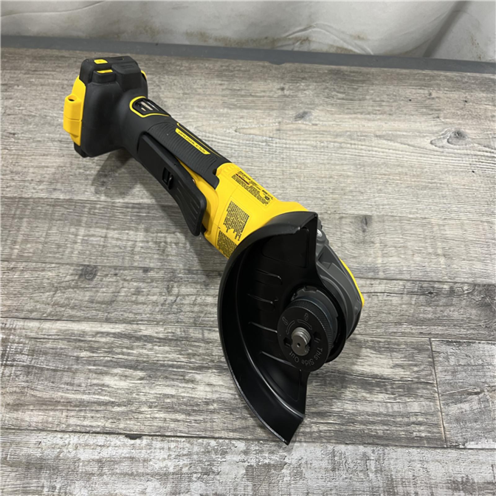 AS-IS DEWALT 20V MAX Cordless Brushless 4.5 - 5 in. Paddle Switch Angle Grinder with FLEXVOLT ADVANTAGE (Tool Only)