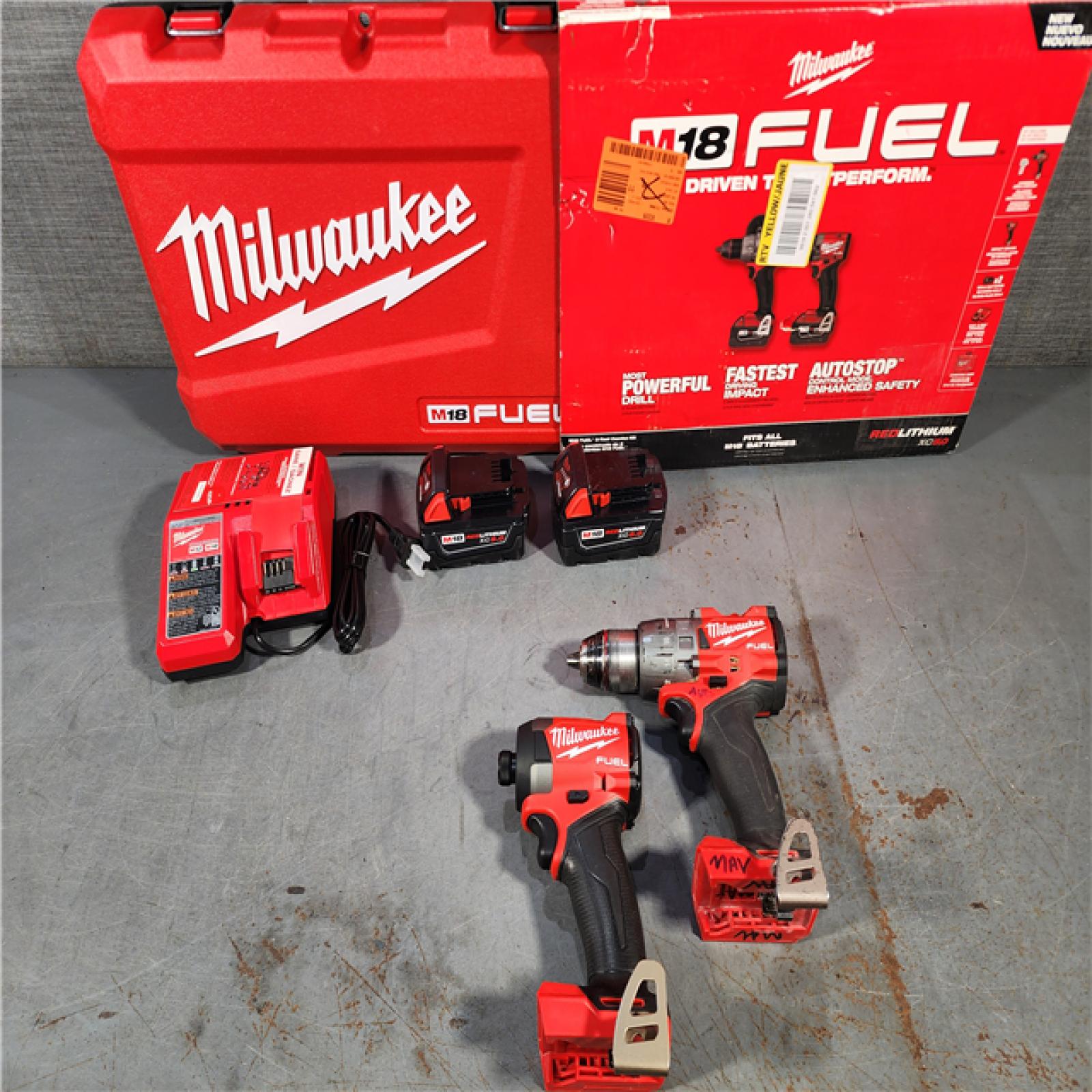 HOUSTON LOCATION - AS-IS Milwaukee M18 FUEL 18V Lithium-Ion Brushless Cordless Hammer Drill and Impact Driver Combo Kit (2-Tool) with 2 Batteries