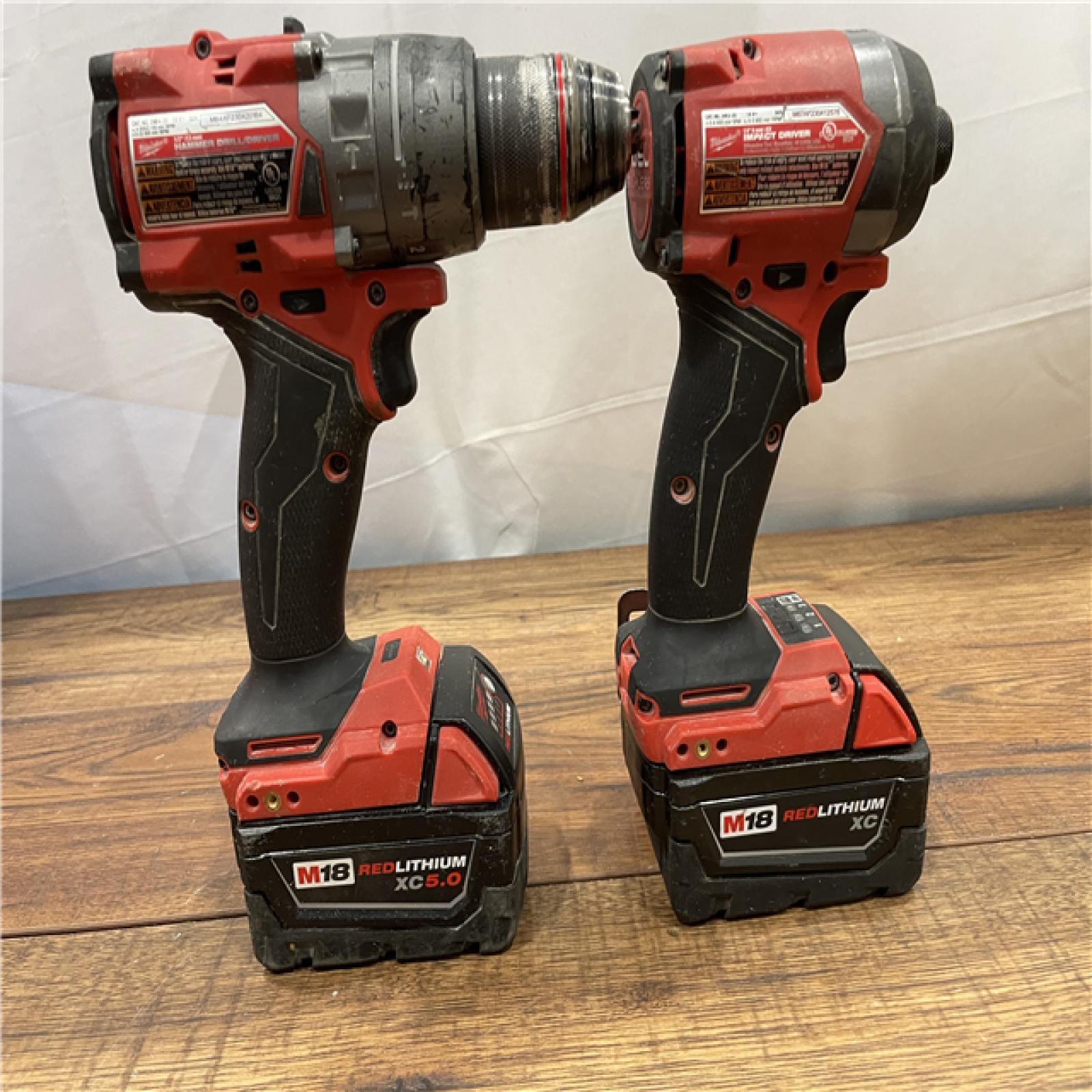 AS-IS Milwaukee M18 FUEL 18V Lithium-Ion Brushless Cordless Hammer Drill and Impact Driver Combo Kit