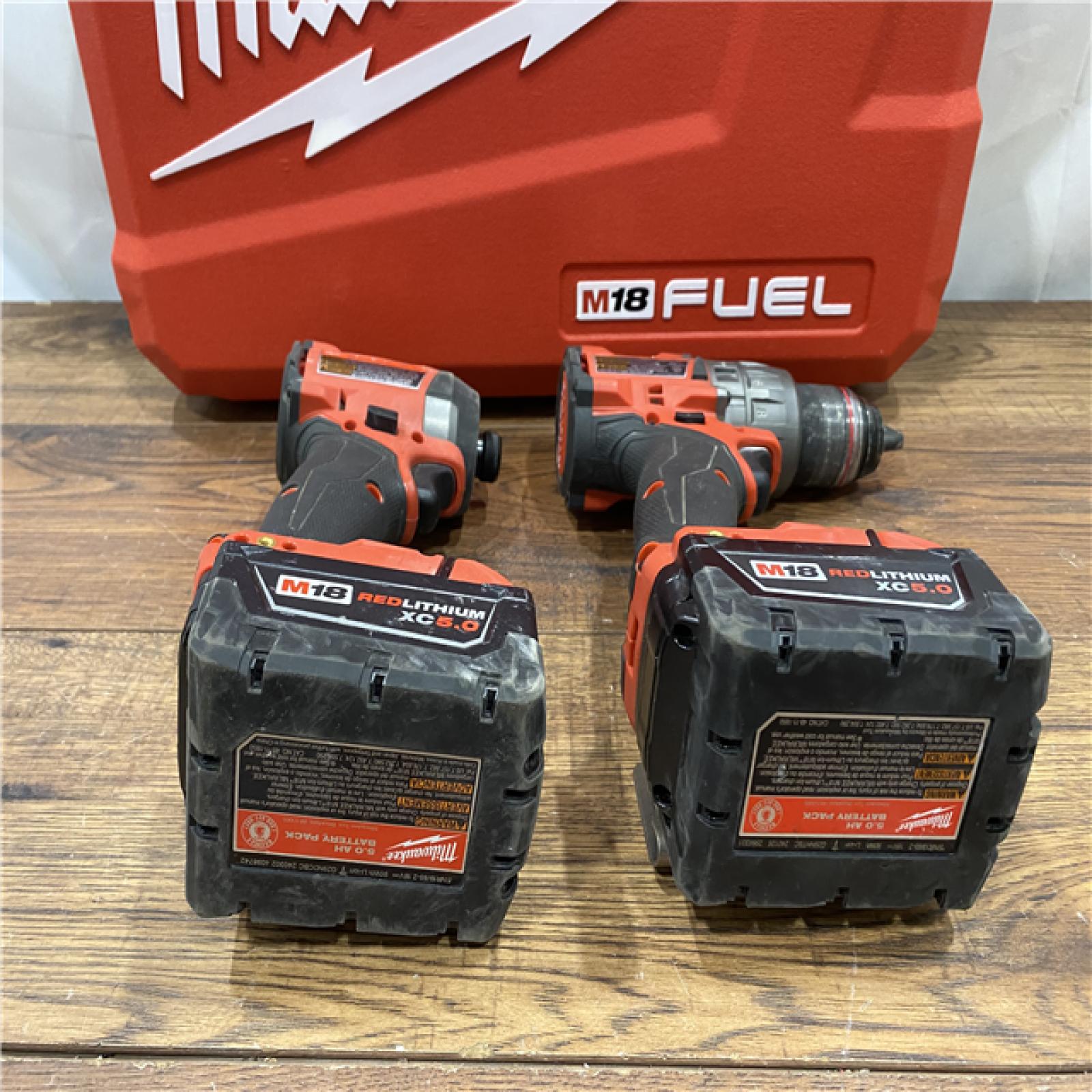 AS IS Milwaukee M18 FUEL 18V Lithium-Ion Brushless Cordless Hammer Drill and Impact Driver Combo Kit (2-Tool) with 2 Batteries