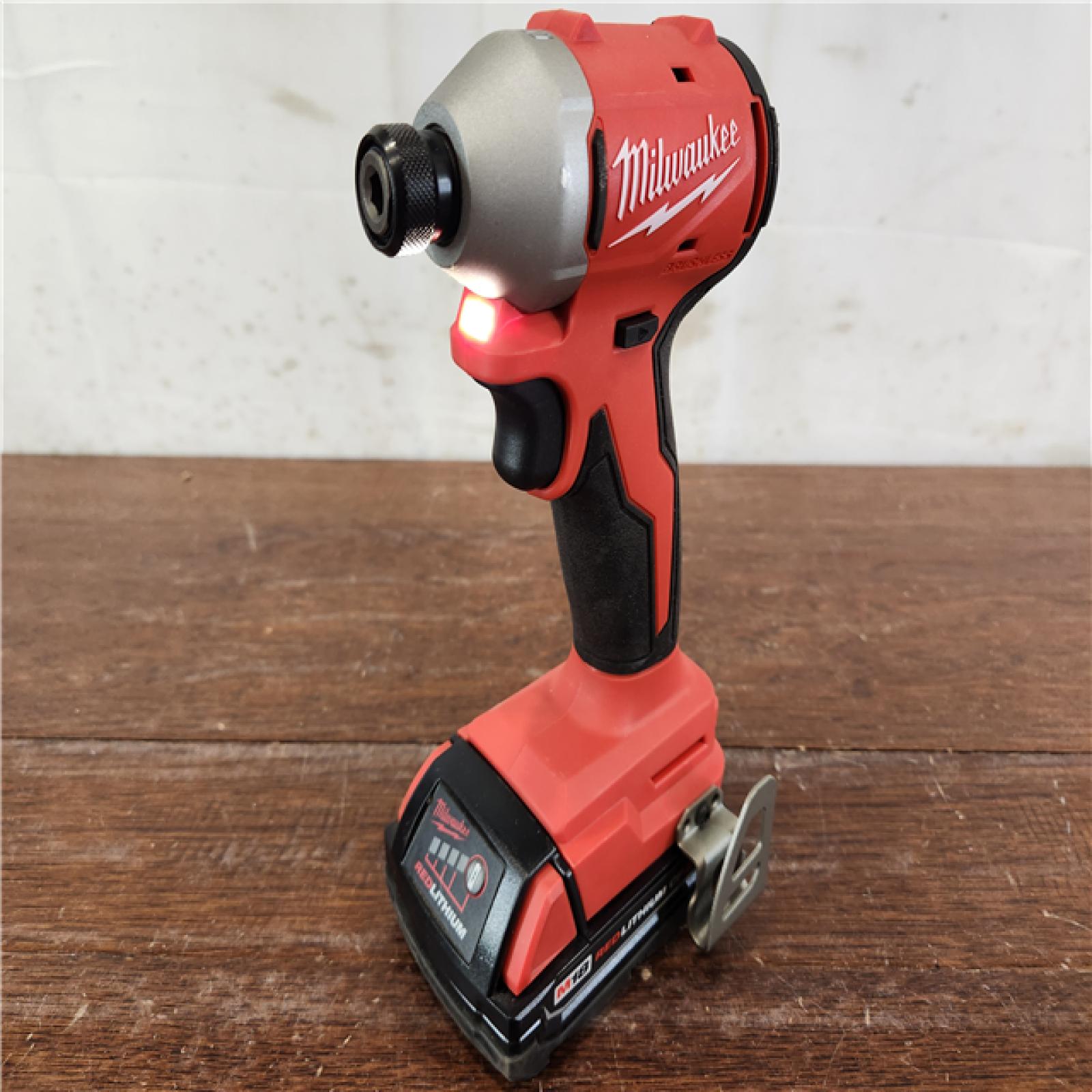 AS-IS Milwaukee M18 Lithium-Ion Brushless Cordless 1/4 in. Impact Driver Kit