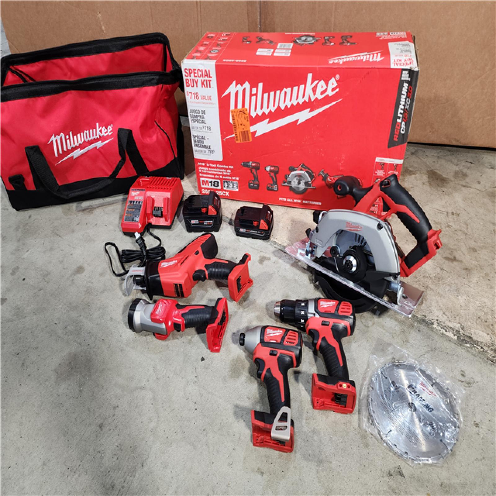 HOUSTON LOCATION - AS-IS (APPEARS LIKE NEW) Milwaukee M18 18-Volt Lithium-Ion Cordless Combo Tool Kit (5-Tool) with (1) 3.0Ah and (1) 1.5Ah Battery, (1) Charger, (1) Tool Bag