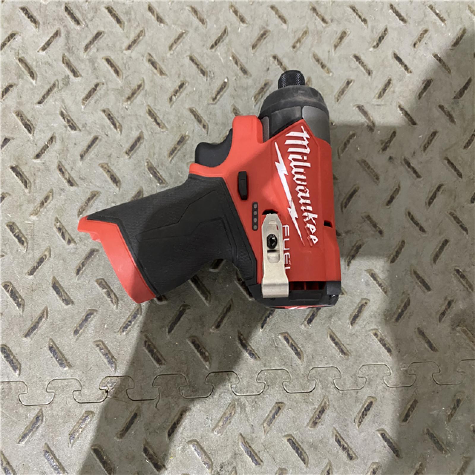 Houston location AS-IS  MILWAUKEE M12 Fuel Atornillador De Impacto Hexagonal De 1/4