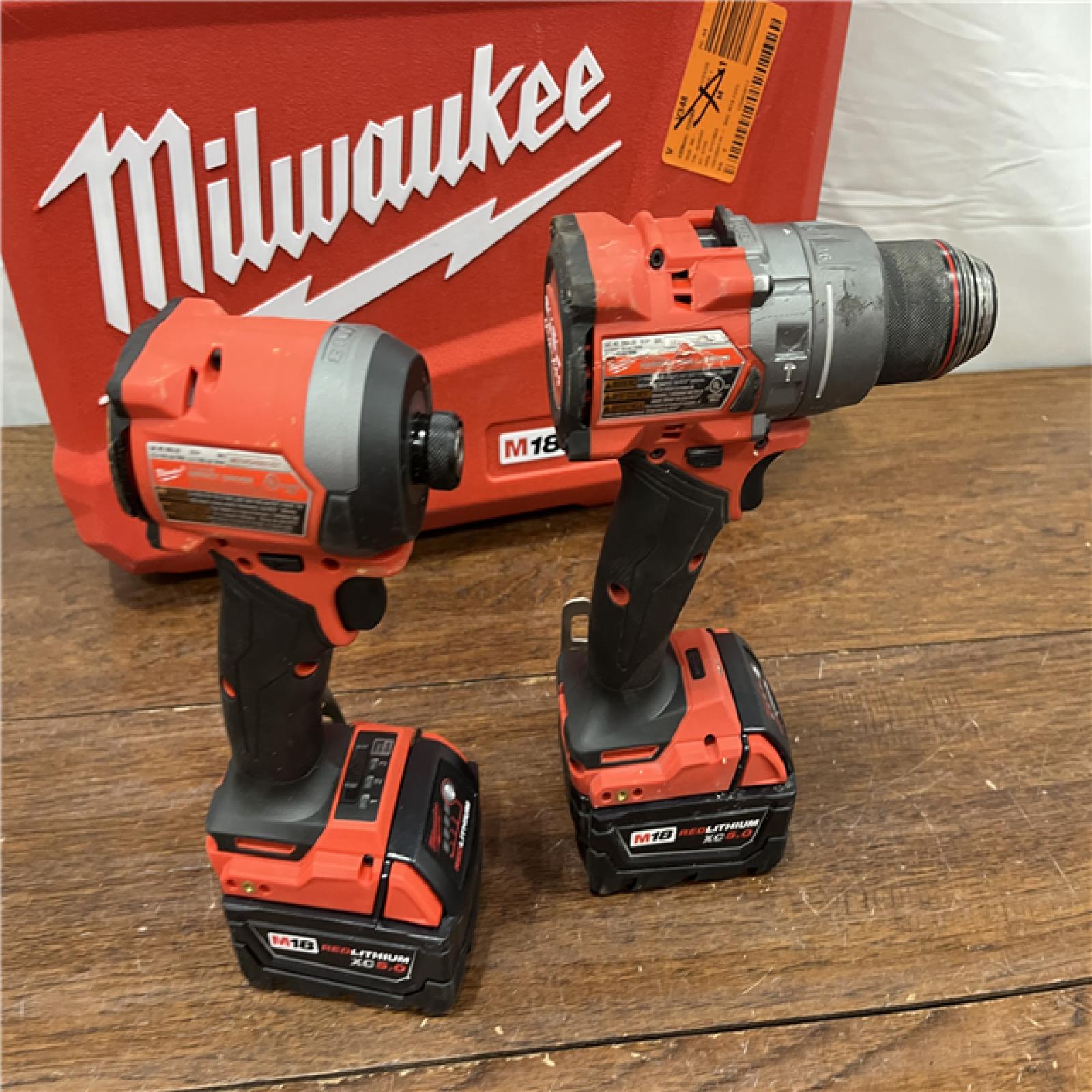 AS-IS Milwaukee M18 FUEL 18V Lithium-Ion Brushless Cordless Hammer Drill and Impact Driver Combo Kit (2-Tool) with 2 Batteries