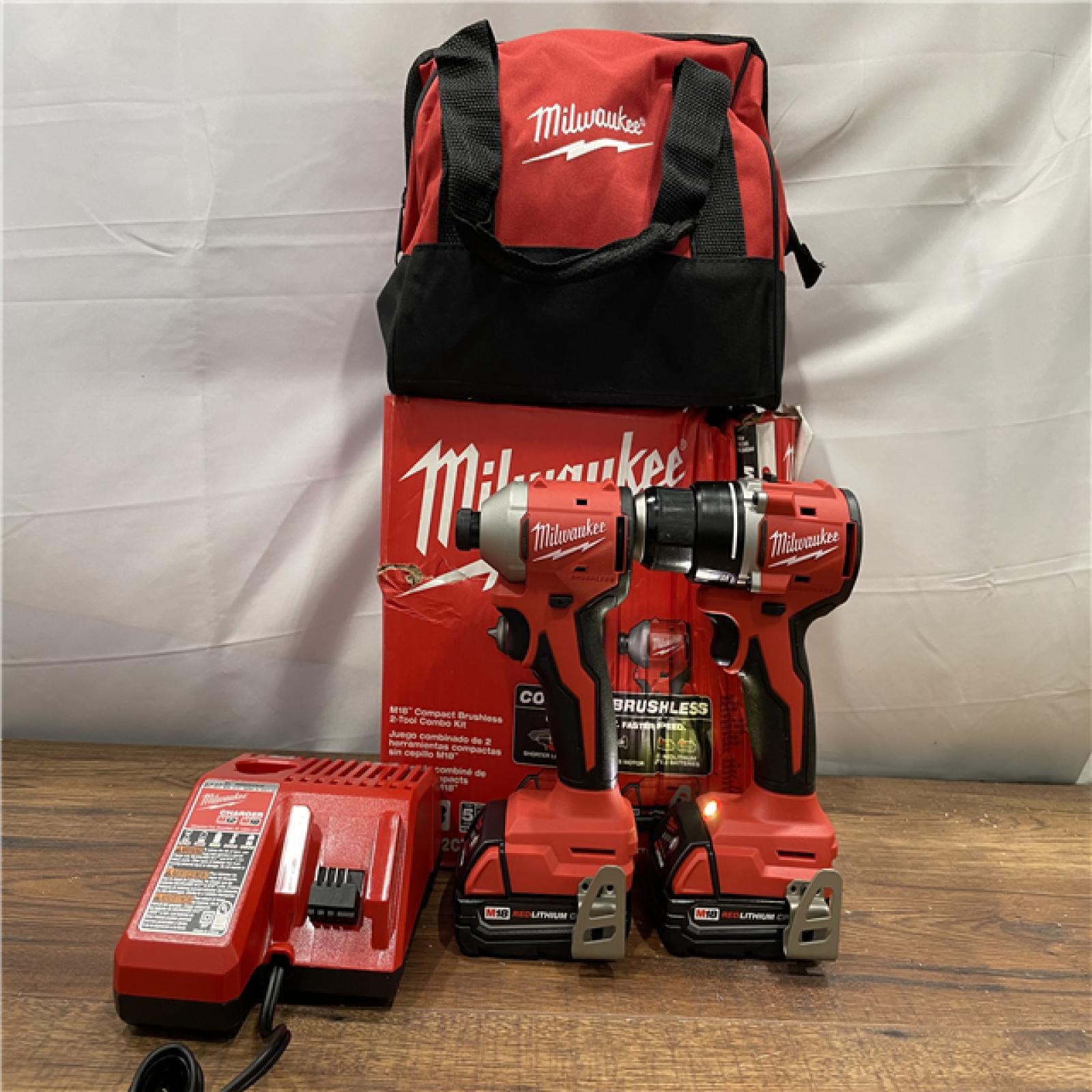 AS-IS Milwaukee M18 18V Lithium-Ion Brushless Cordless Compact Drill/Impact Combo Kit (2-Tool) W/(2) 2.0 Ah Batteries, Charger & Bag