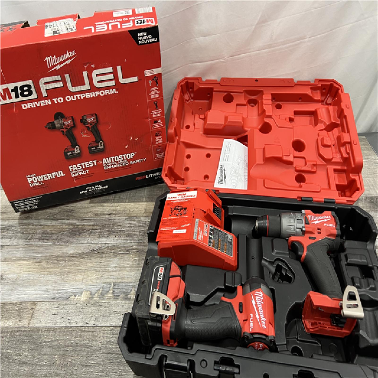 AS-IS MILWAUKEE M18 FUEL 18V Lithium-Ion Brushless Cordless Hammer Drill and Impact Driver Combo Kit (2-Tool) with 2 Batteries