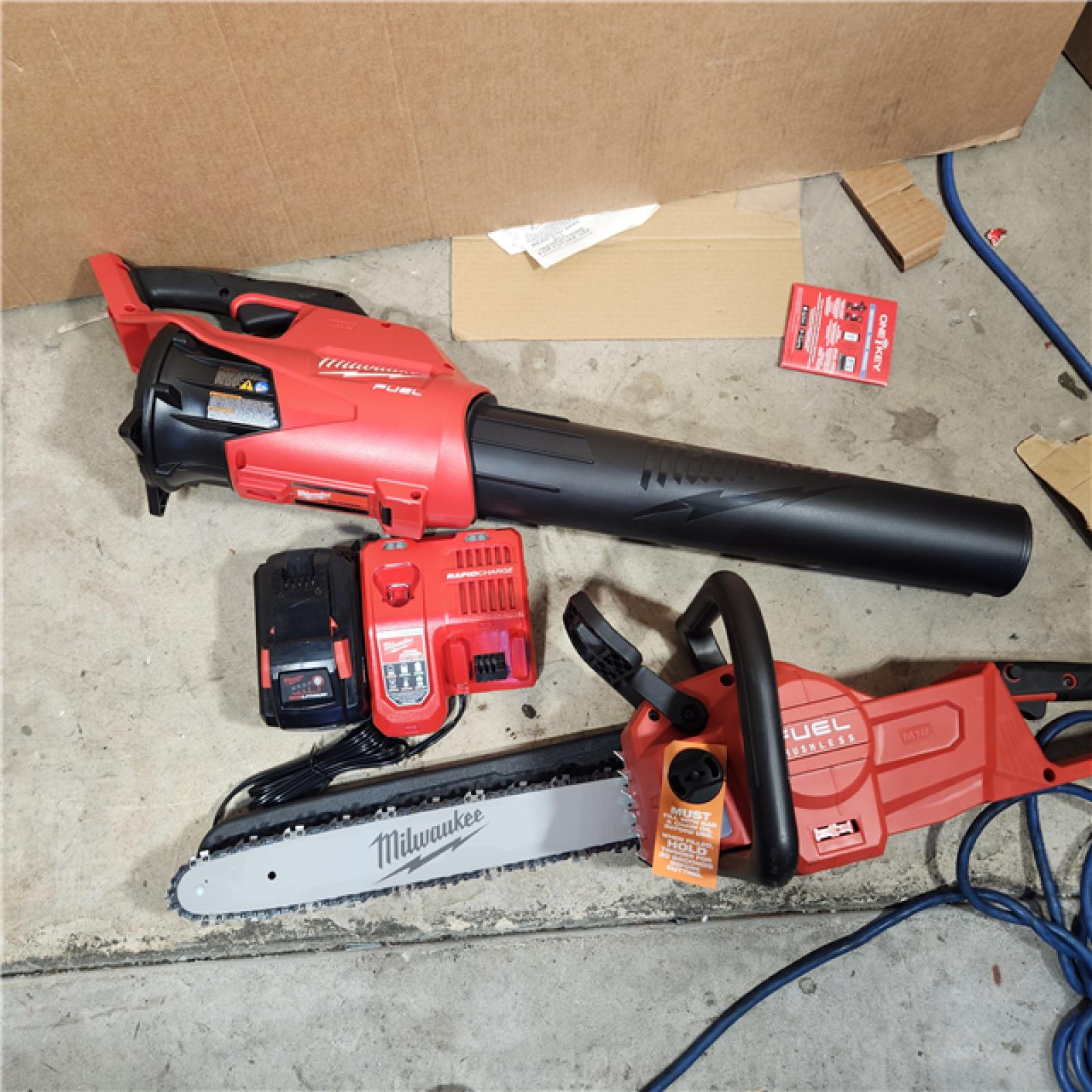 Houston location- AS-IS Milwaukee 2727-21HDP M18 18V FUEL Lithium-Ion Brushless Cordless 2-Tool Combo Kit with 16 Chainsaw and Handheld Blower 12.0 Ah