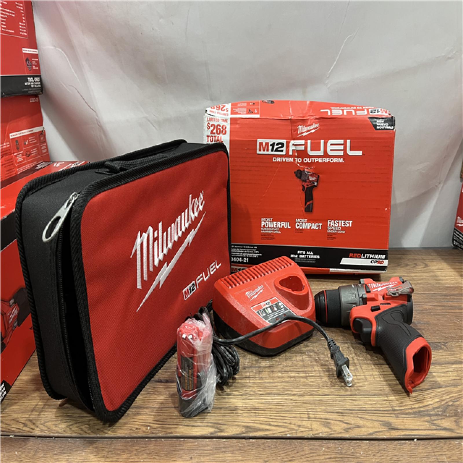 AS-IS Milwaukee M12 FUEL 12-Volt Lithium-Ion Brushless Cordless 1/2 in. Hammer Drill Kit with 1 Compact 2.0Ah Battery Pack and 1 Charger