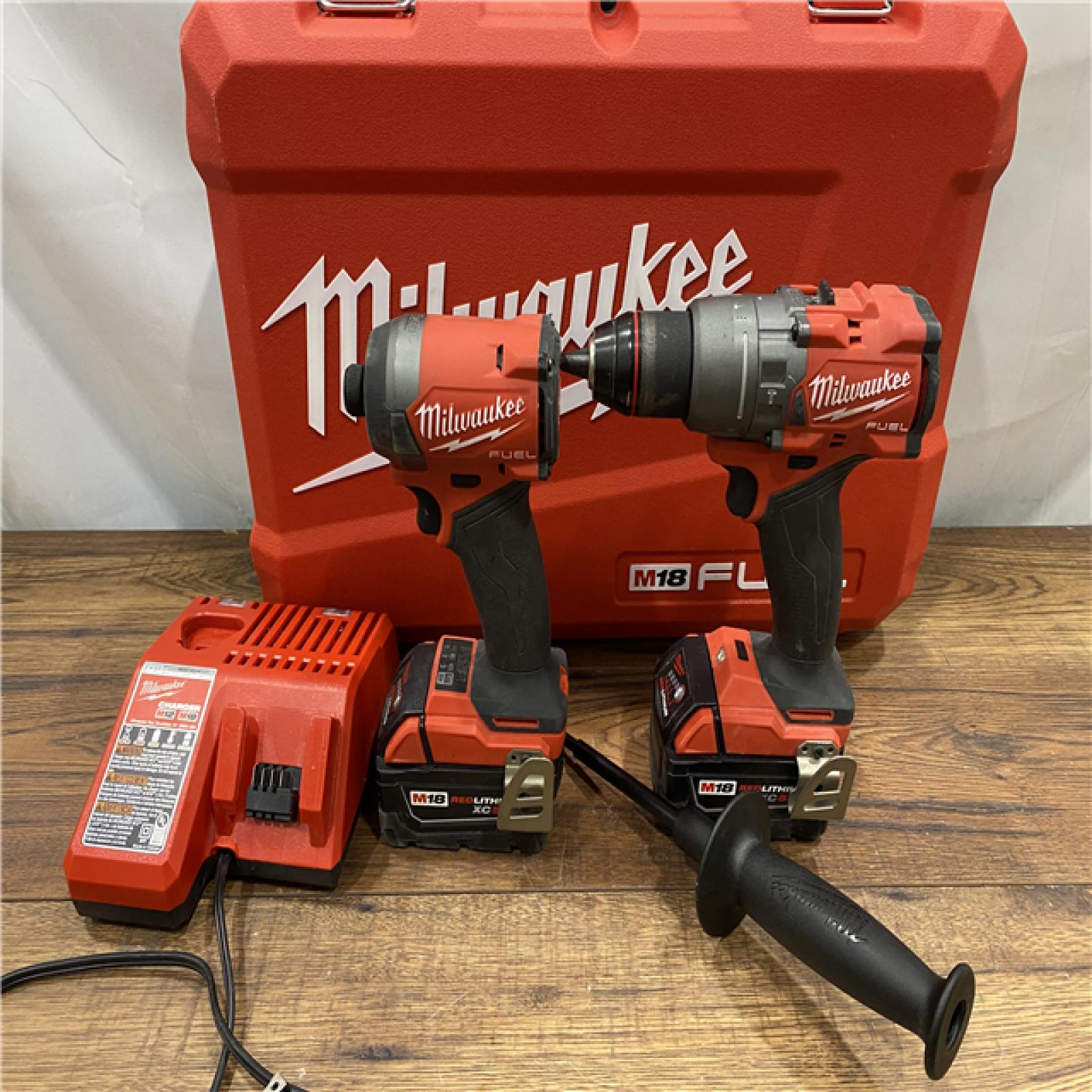 AS IS Milwaukee M18 FUEL 18V Lithium-Ion Brushless Cordless Hammer Drill and Impact Driver Combo Kit (2-Tool) with 2 Batteries