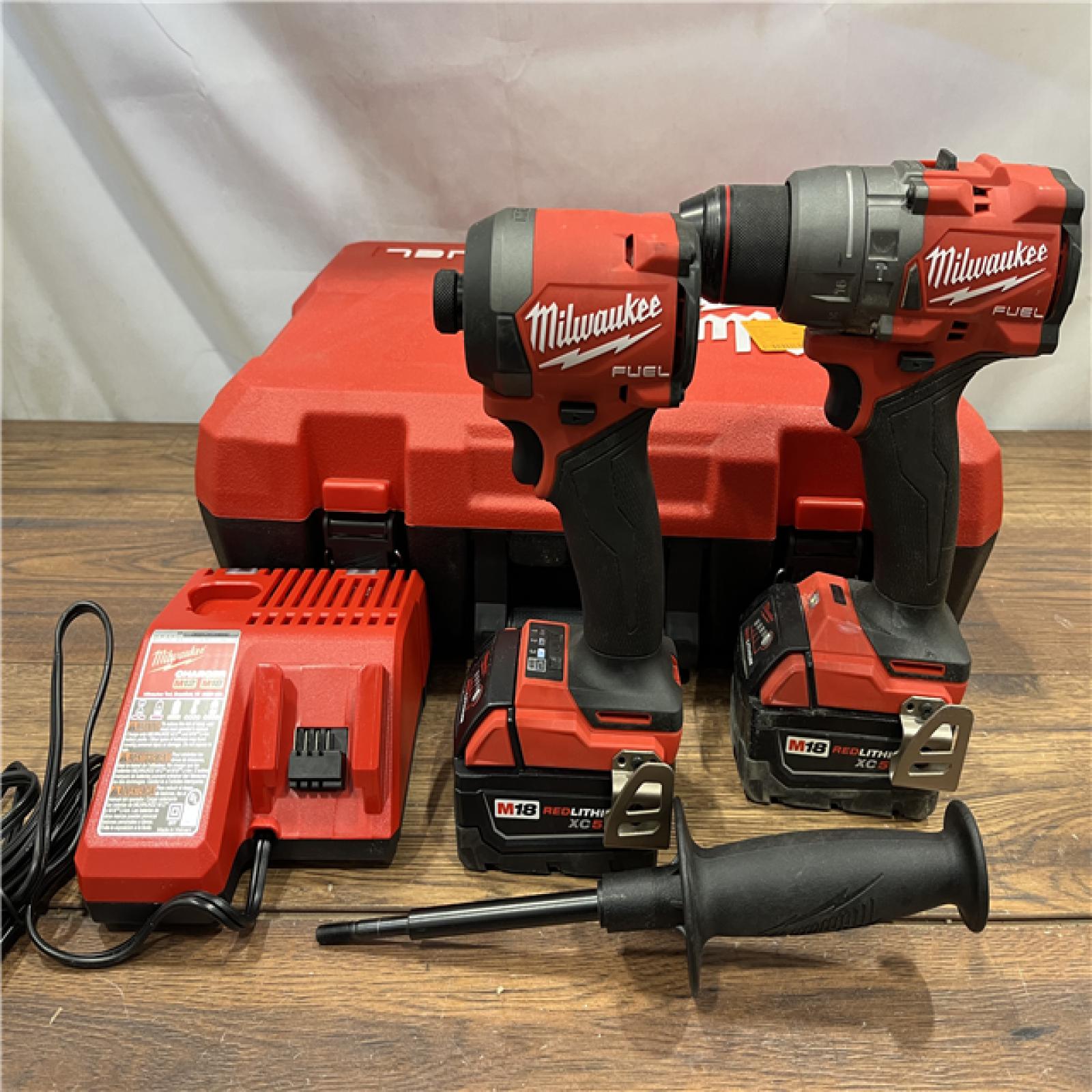 AS IS Milwaukee M18 FUEL 18V Lithium-Ion Brushless Cordless Hammer Drill and Impact Driver Combo Kit (2-Tool) with 2 Batteries