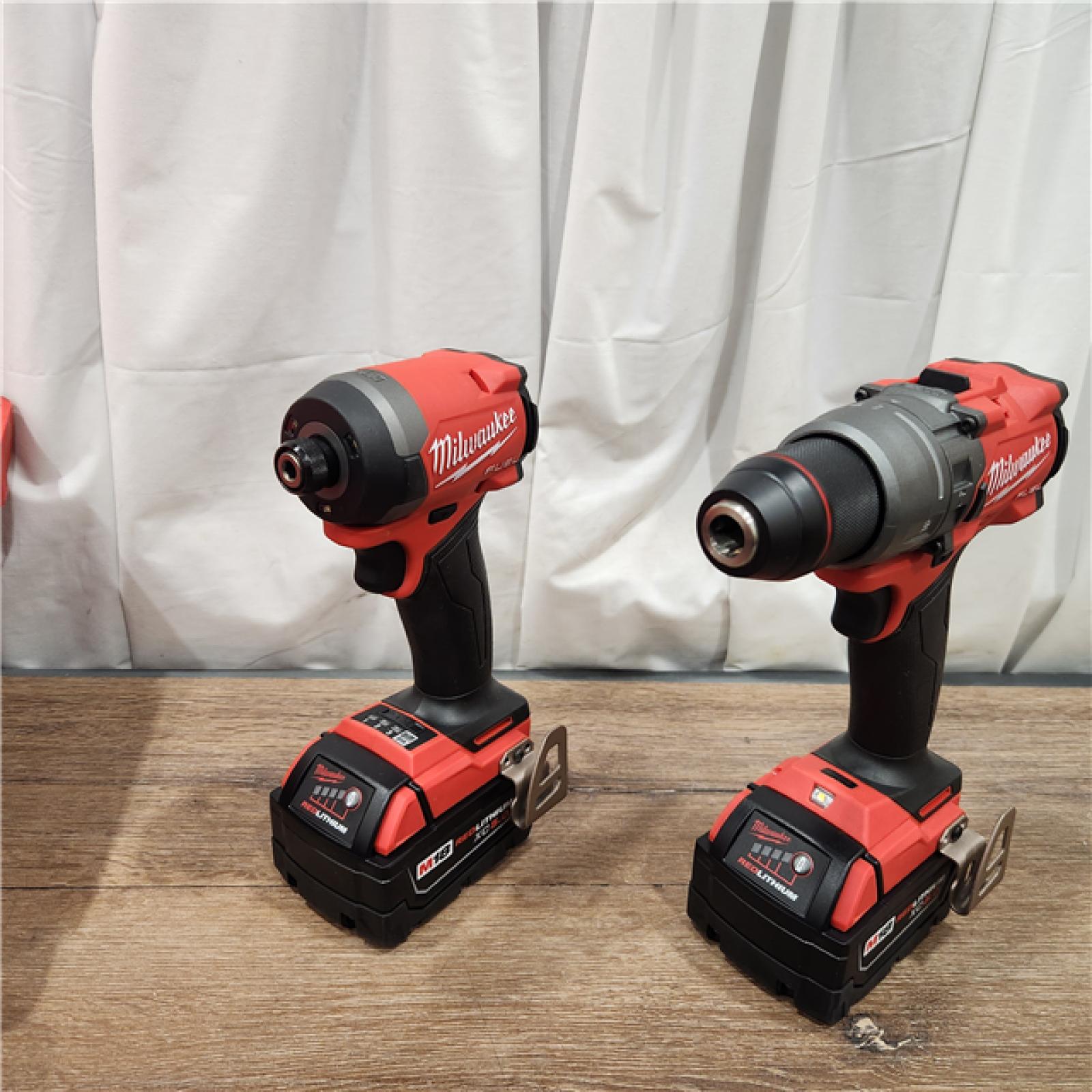 AS-IS Milwaukee M18 FUEL 18V Lithium-Ion Brushless Cordless Hammer Drill and Impact Driver Combo Kit (2-Tool) with 2 Batteries