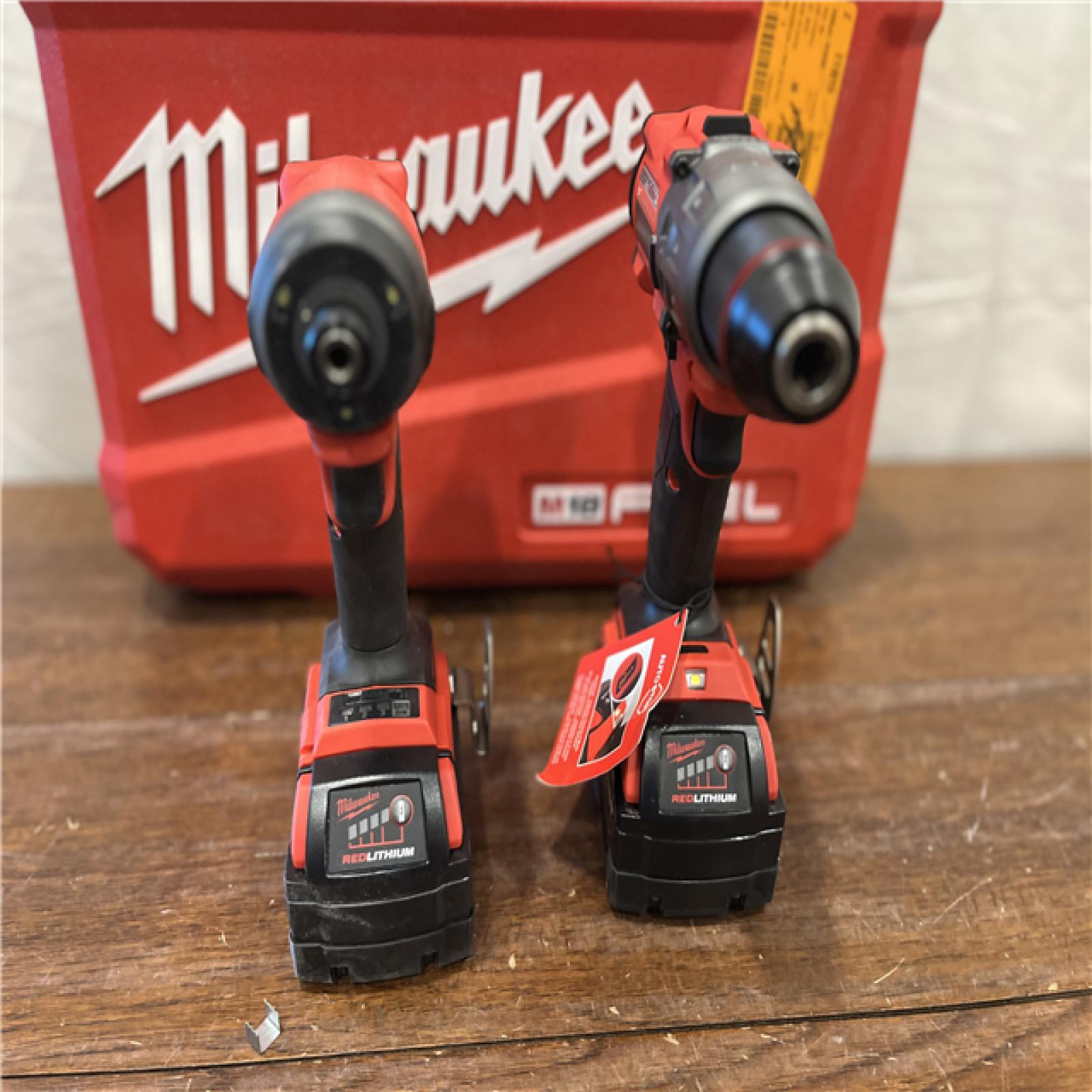 AS-IS Milwaukee M18 FUEL 18V Lithium-Ion Brushless Cordless Hammer Drill and Impact Driver Combo Kit (2-Tool) with 2 Batteries