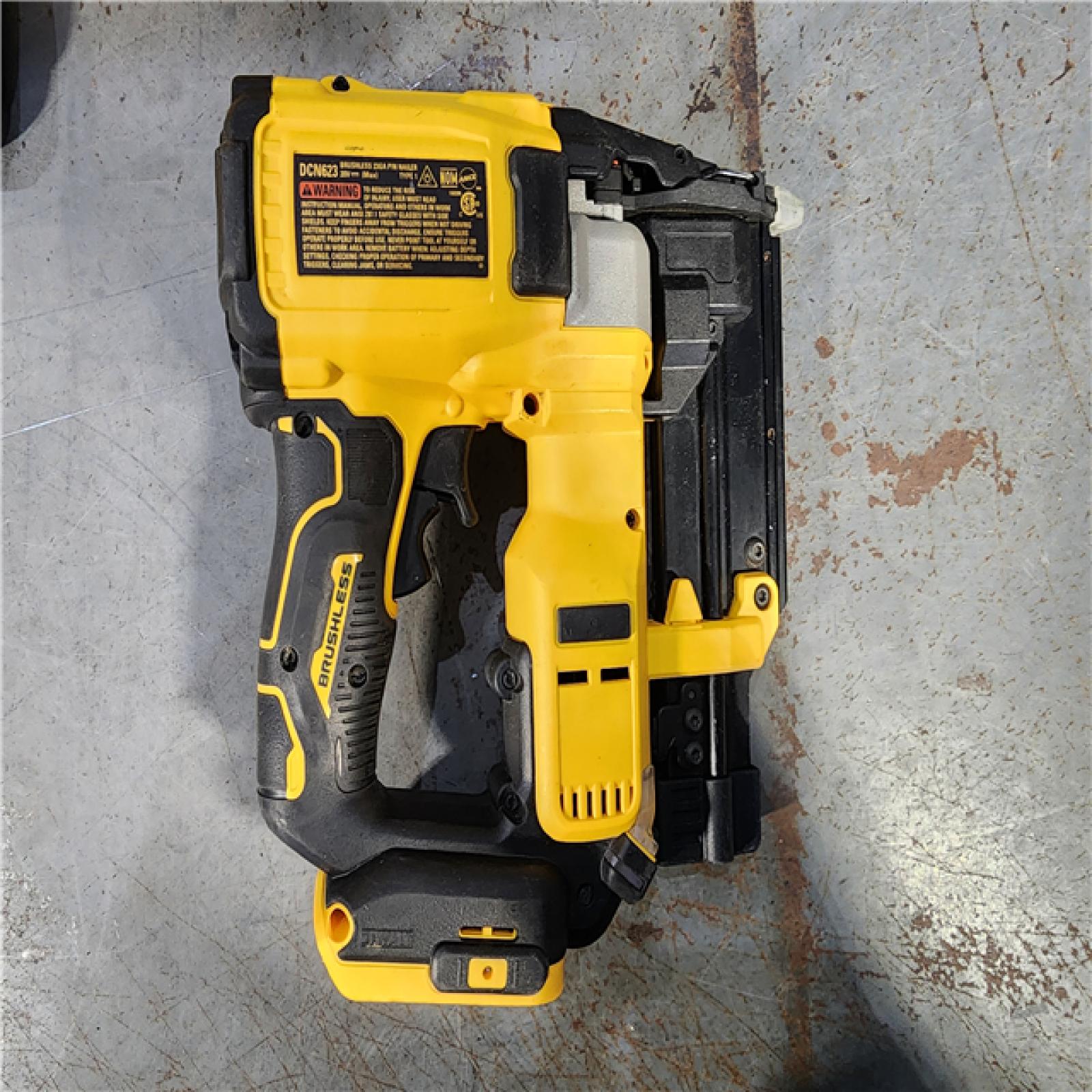 HOUSTON LOCATION - AS-IS DEWALT ATOMIC 20V MAX Lithium Ion Cordless 23 Gauge Pin Nailer Kit with 2.0Ah Battery and Charger