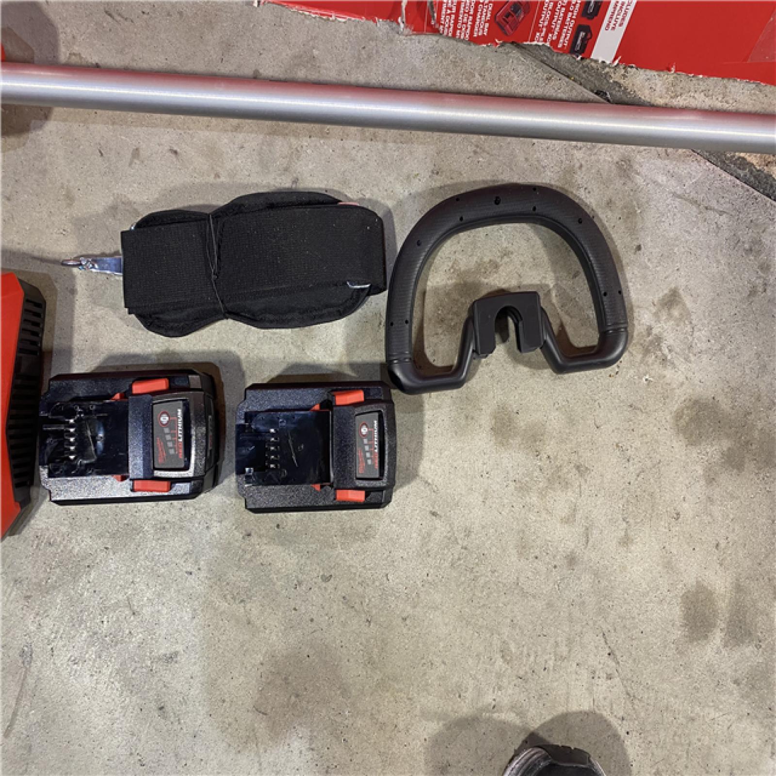 HOUSTON LOCATION -AS-IS M18 FUEL 18V Brushless Cordless 17 in. Dual Battery Straight Shaft String Trimmer with (2) 8.0 Ah Batteries and Charger