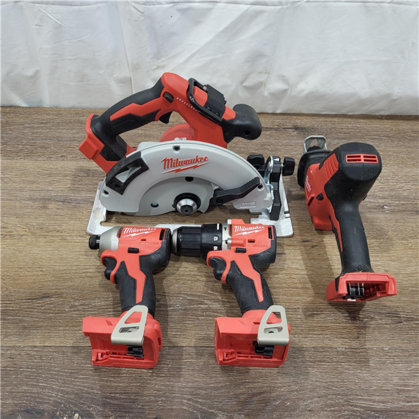 AS-IS M18 18-Volt Lithium-Ion Brushless Cordless Combo Kit (4-Tool) with 2-Batteries, 1-Charger and Tool Bag