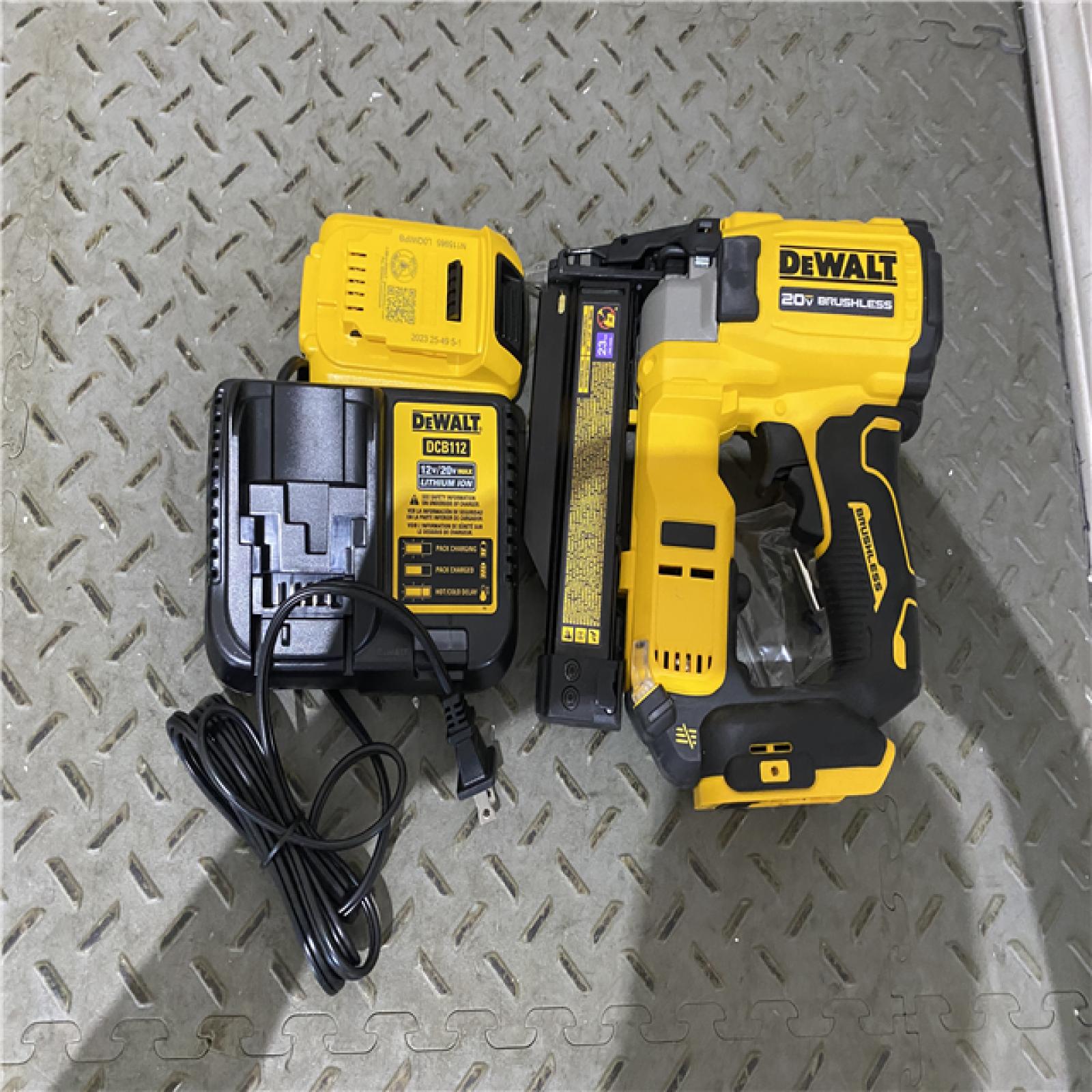 Houston location AS-IS DEWALT ATOMIC 20V MAX Lithium Ion Cordless 23 Gauge Pin Nailer Kit with 2.0Ah Battery and Charger