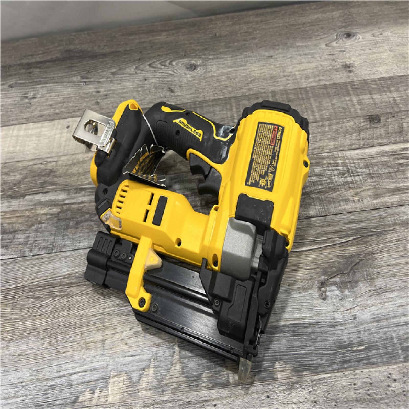 AS-IS DEWALT ATOMIC 20V MAX Lithium Ion Cordless 23 Gauge Pin Nailer Kit with 2.0Ah Battery and Charger