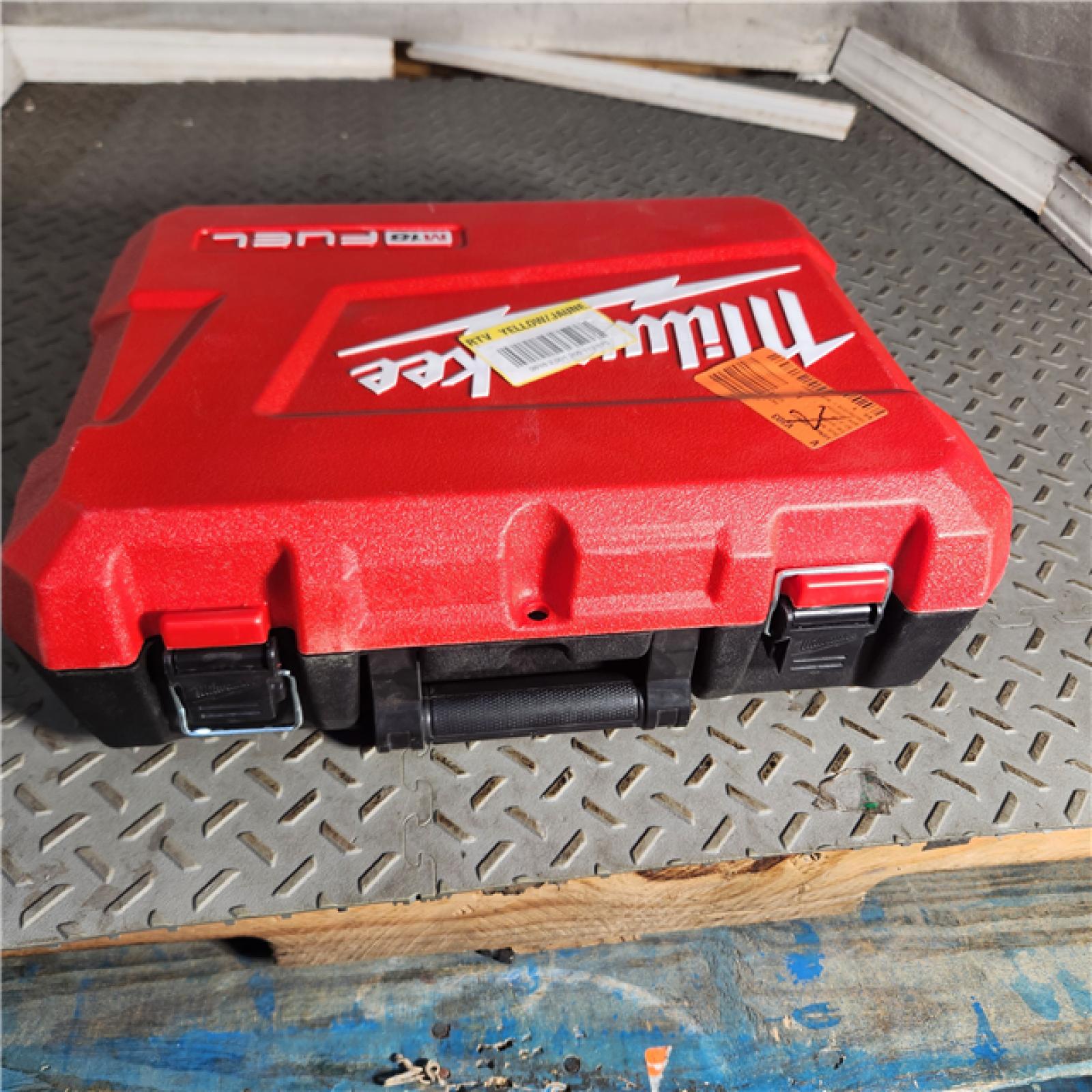 Houston location- AS-IS Milwaukee 2904-22 Hammer Drill Driver Kit with Batteries  Charger & Tool Case  Red