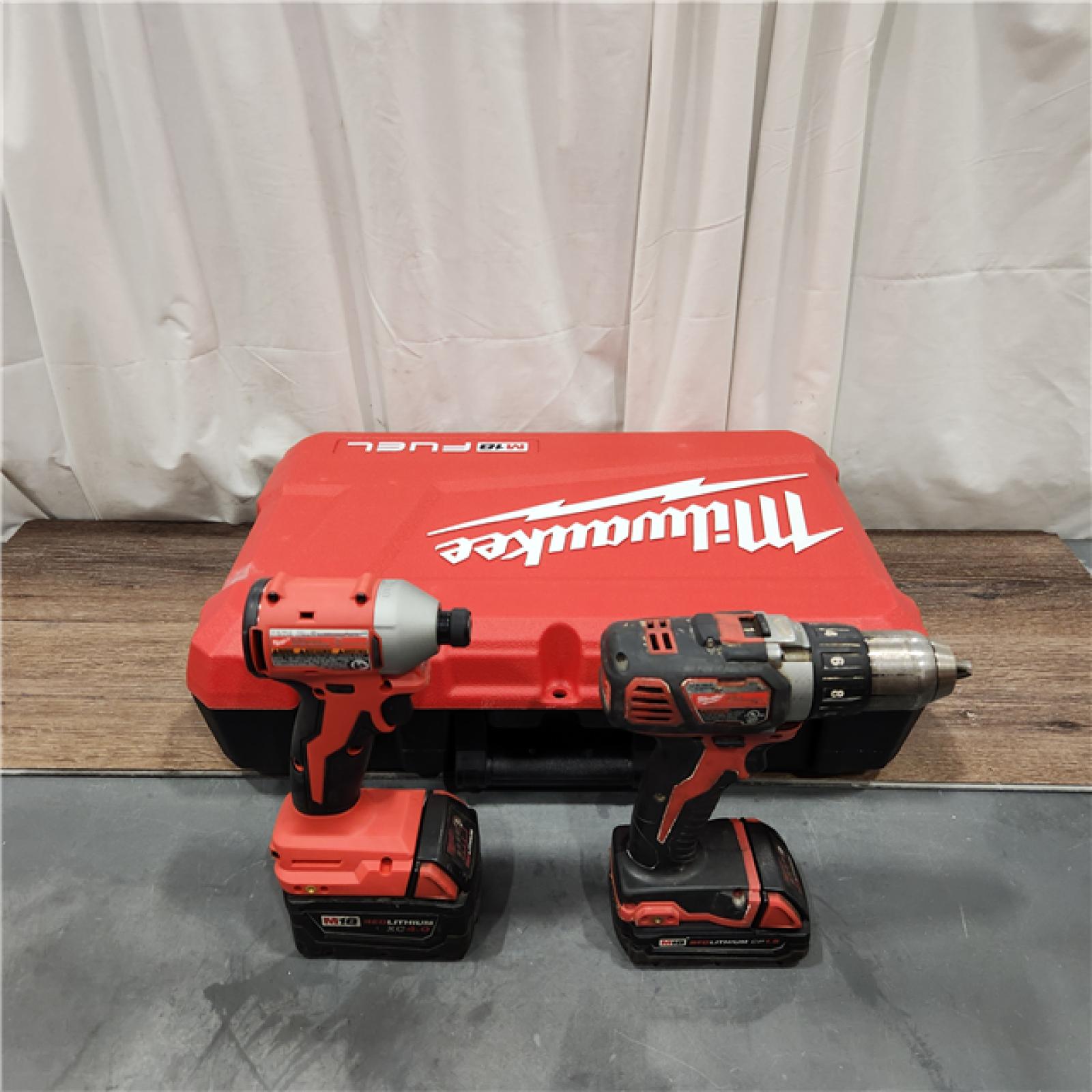 AS IS Milwaukee 2904-22 Hammer Drill Driver Kit with Batteries  Charger & Tool Case  Red