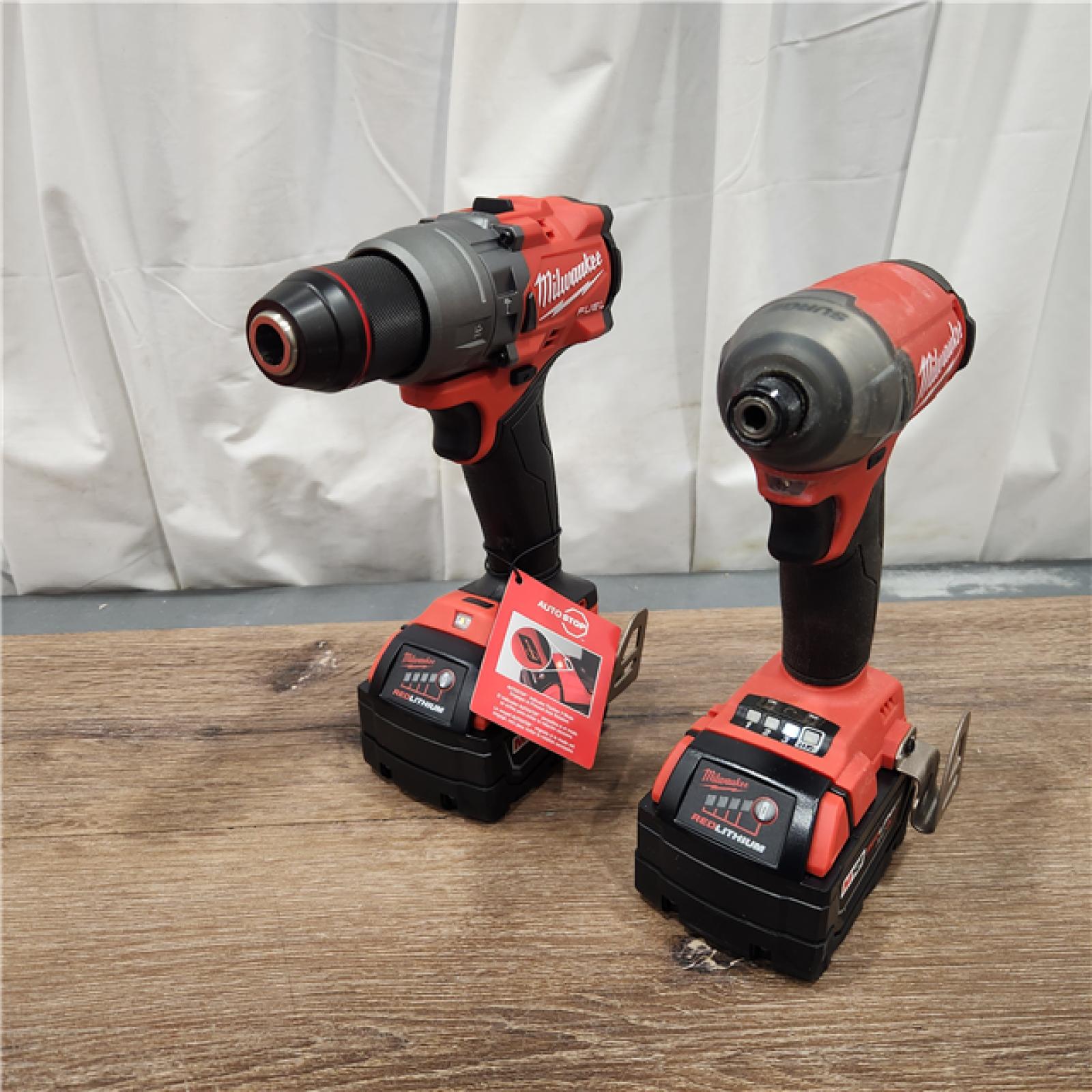 AS-IS Milwaukee M18 FUEL 18V Lithium-Ion Brushless Cordless Hammer Drill and Impact Driver Combo Kit (2-Tool) with 2 Batteries