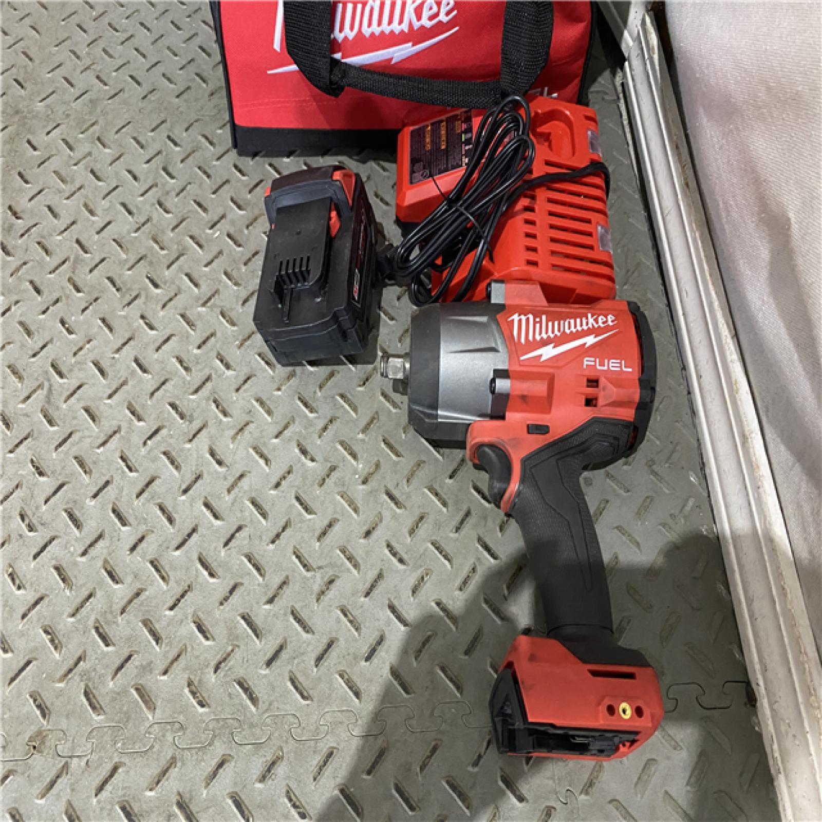 Houston location AS-IS Milwaukee 2967-21B M18 FUEL 1/2 High Torque Impact Wrench W/ Friction Ring 5.0Ah Kit