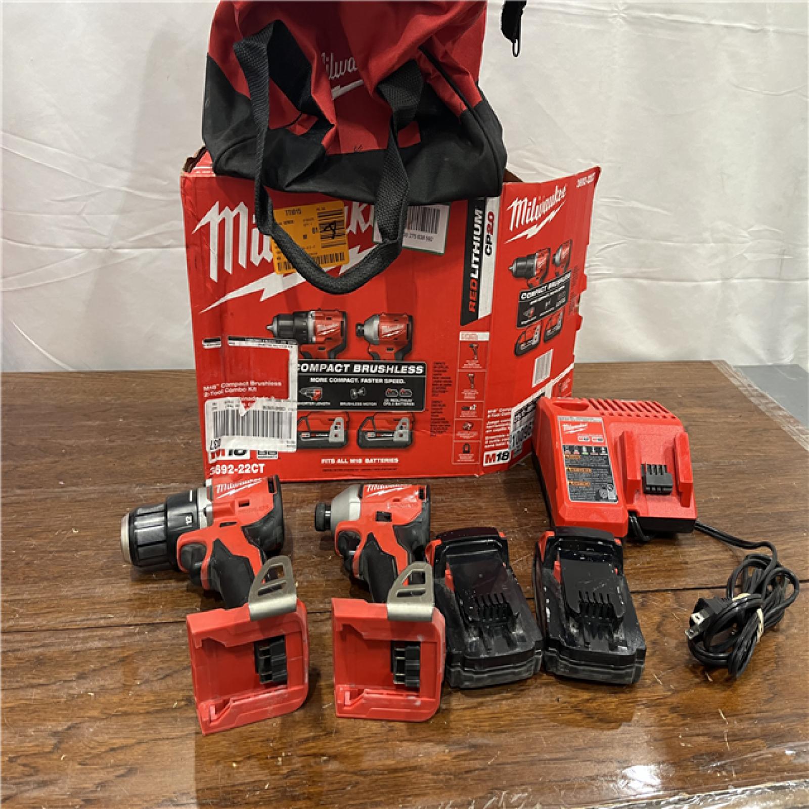 AS-IS M18 18V Lithium-Ion Brushless Cordless Compact Drill/Impact Combo Kit (2-Tool) W/(2) 2.0 Ah Batteries, Charger & Bag