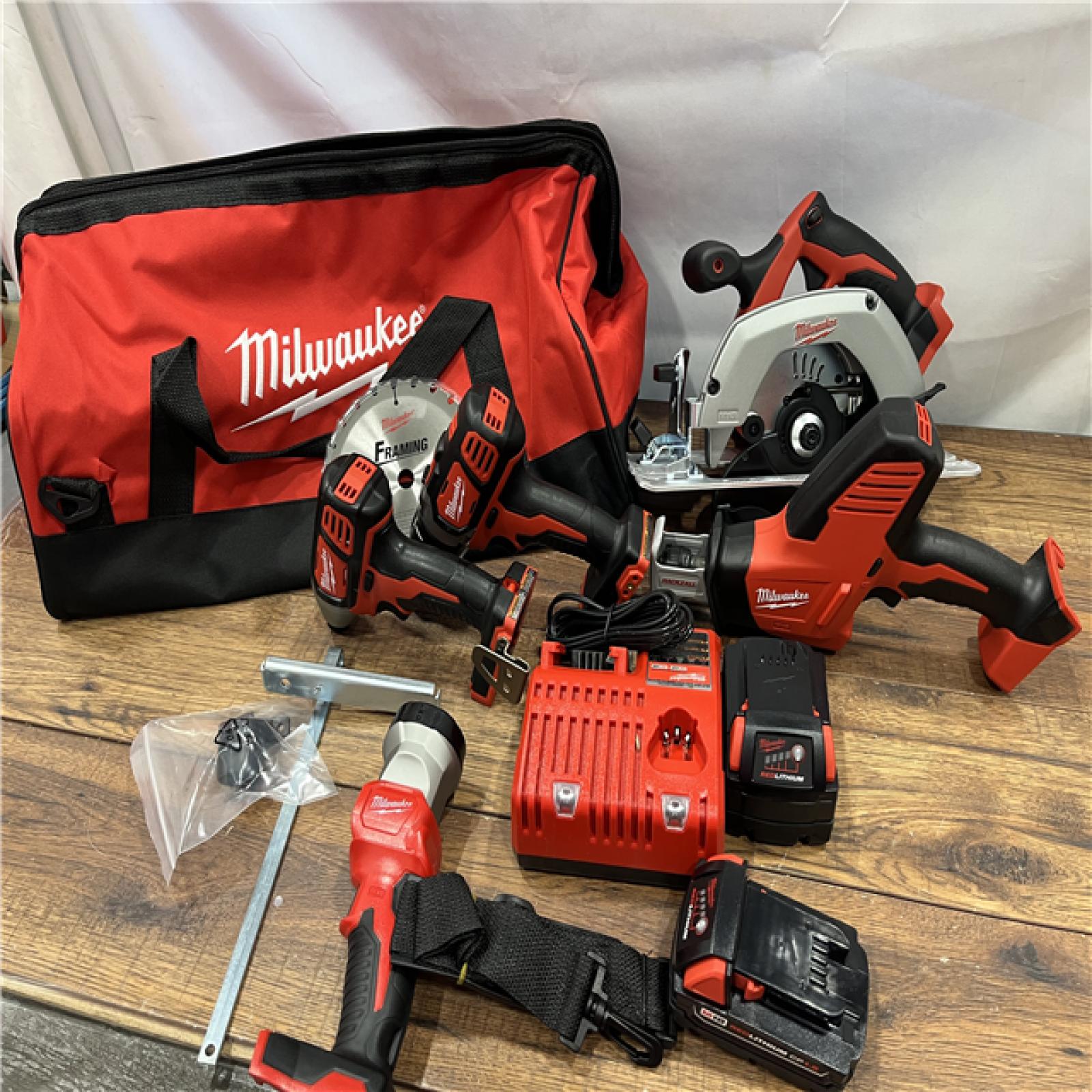 AS-IS Milwaukee M18 18-Volt Lithium-Ion Cordless Combo Tool Kit (5-Tool) with (1) 3.0Ah and (1) 1.5Ah Battery, (1) Charger, (1) Tool Bag