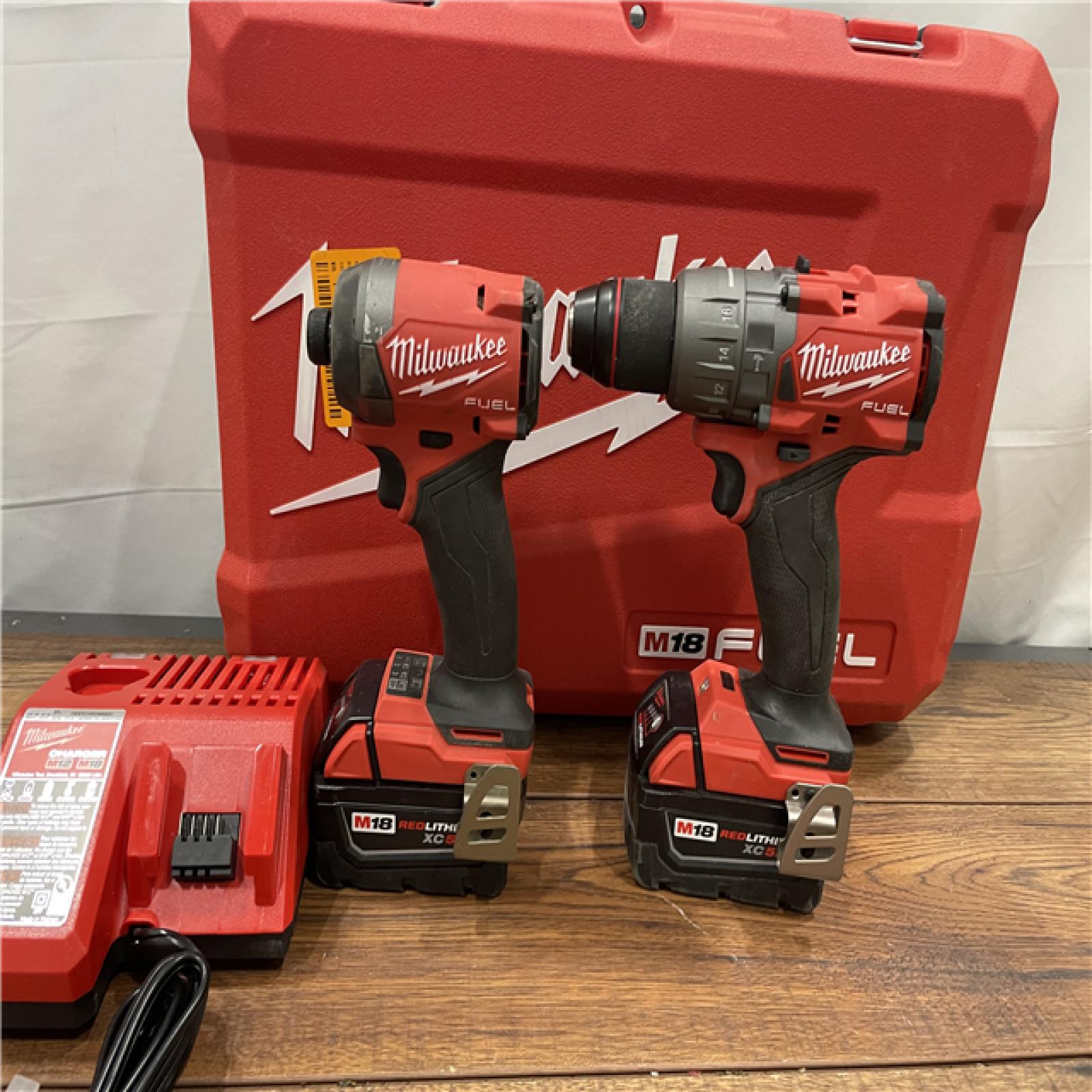 AS-IS Milwaukee M18 FUEL 18V Lithium-Ion Brushless Cordless Hammer Drill and Impact Driver Combo Kit (2-Tool) with 2 Batteries