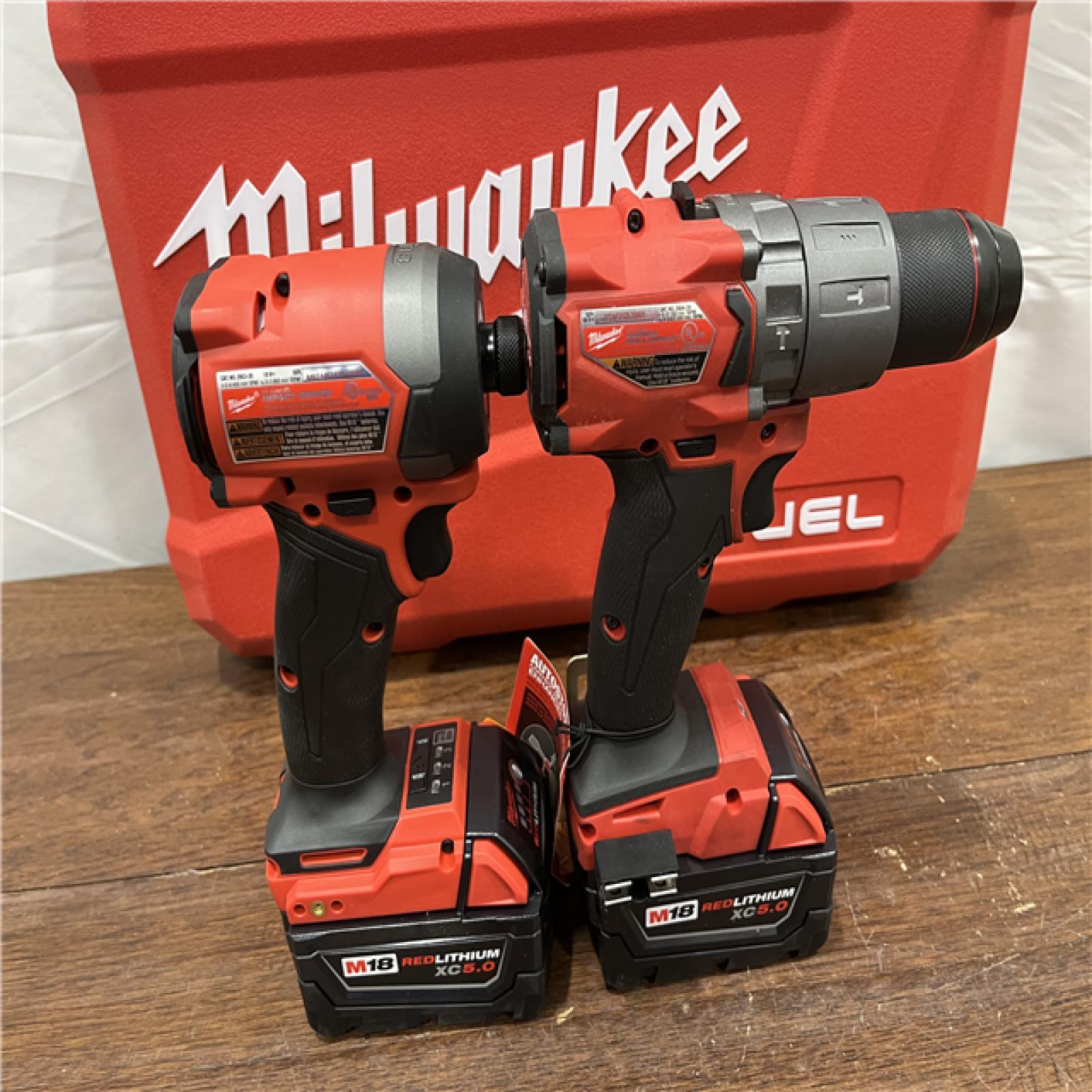 AS-ISMilwaukee M18 FUEL 18V Lithium-Ion Brushless Cordless Hammer Drill and Impact Driver Combo Kit (2-Tool) with 2 Batteries