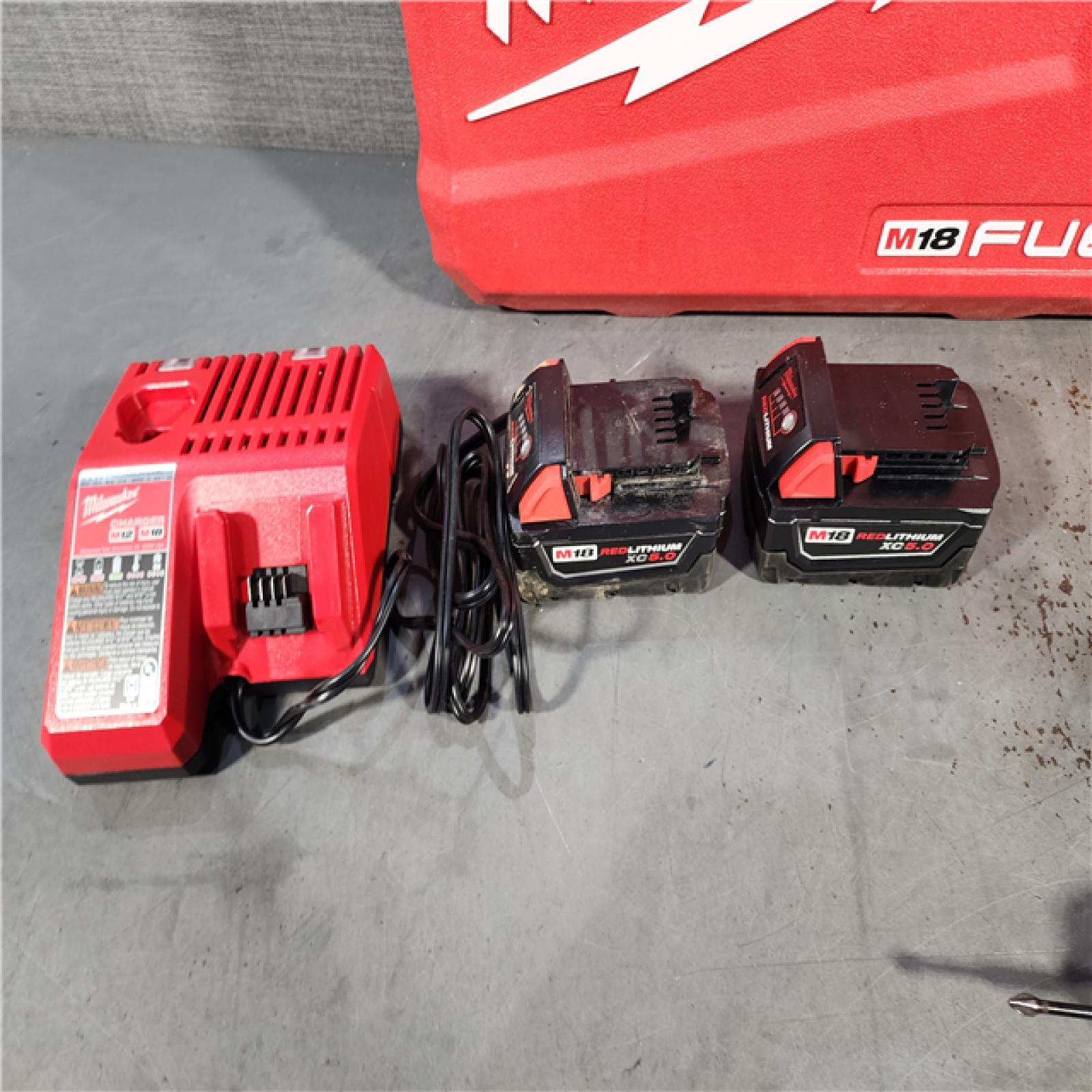 HOUSTON LOCATION - AS-IS Milwaukee M18 FUEL 18V Lithium-Ion Brushless Cordless Hammer Drill and Impact Driver Combo Kit (2-Tool) with 2 Batteries