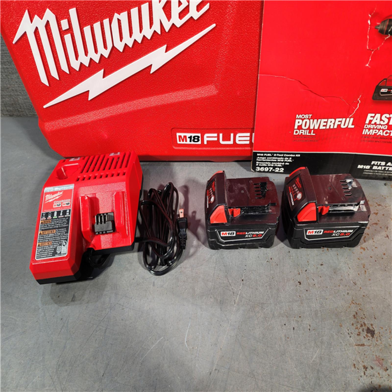 HOUSTON LOCATION - AS-IS (APPEARS LIKE NEW) Milwaukee M18 FUEL 18V Lithium-Ion Brushless Cordless Hammer Drill and Impact Driver Combo Kit (2-Tool) with 2 Batteries