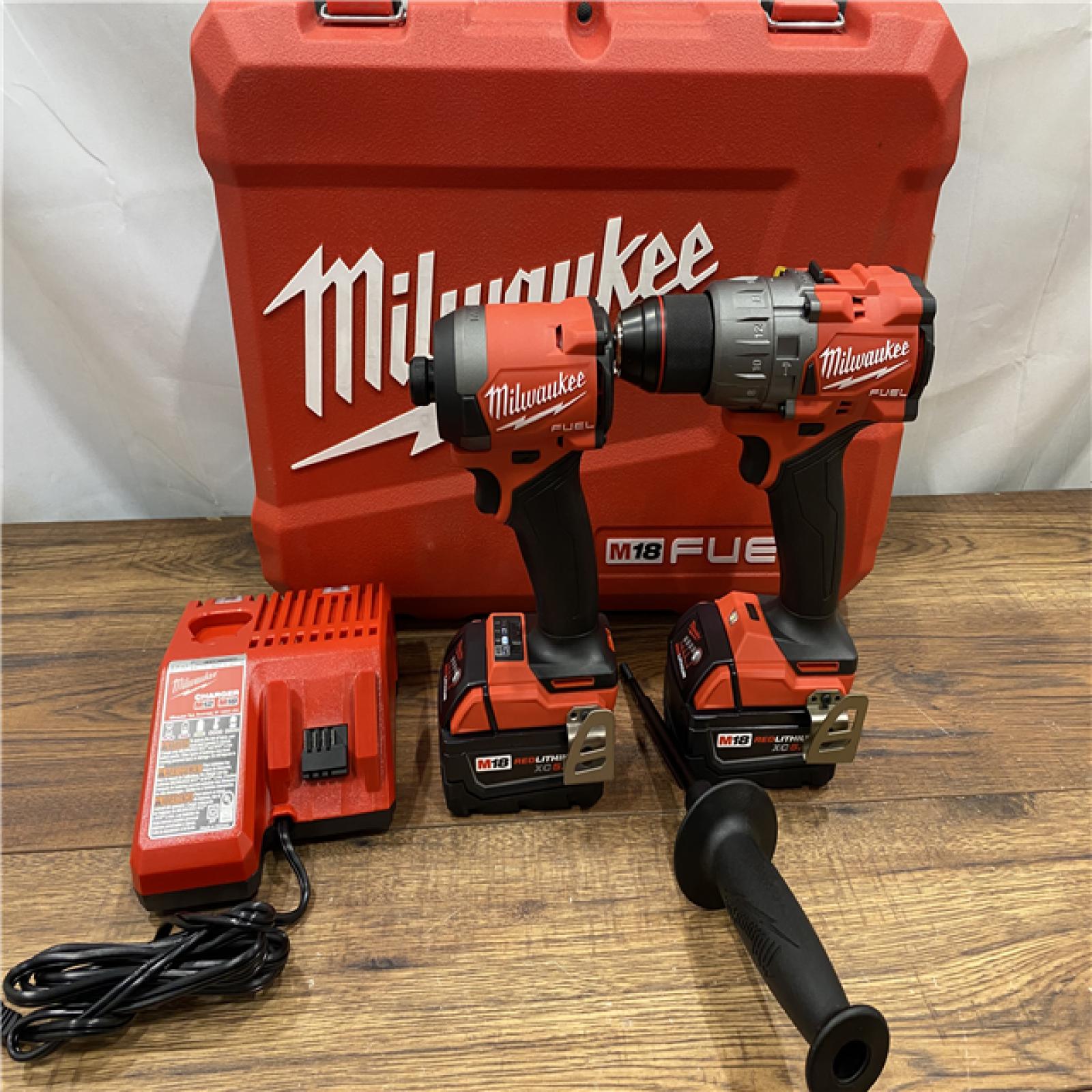 AS IS Milwaukee M18 FUEL 18V Lithium-Ion Brushless Cordless Hammer Drill and Impact Driver Combo Kit (2-Tool) with 2 Batteries