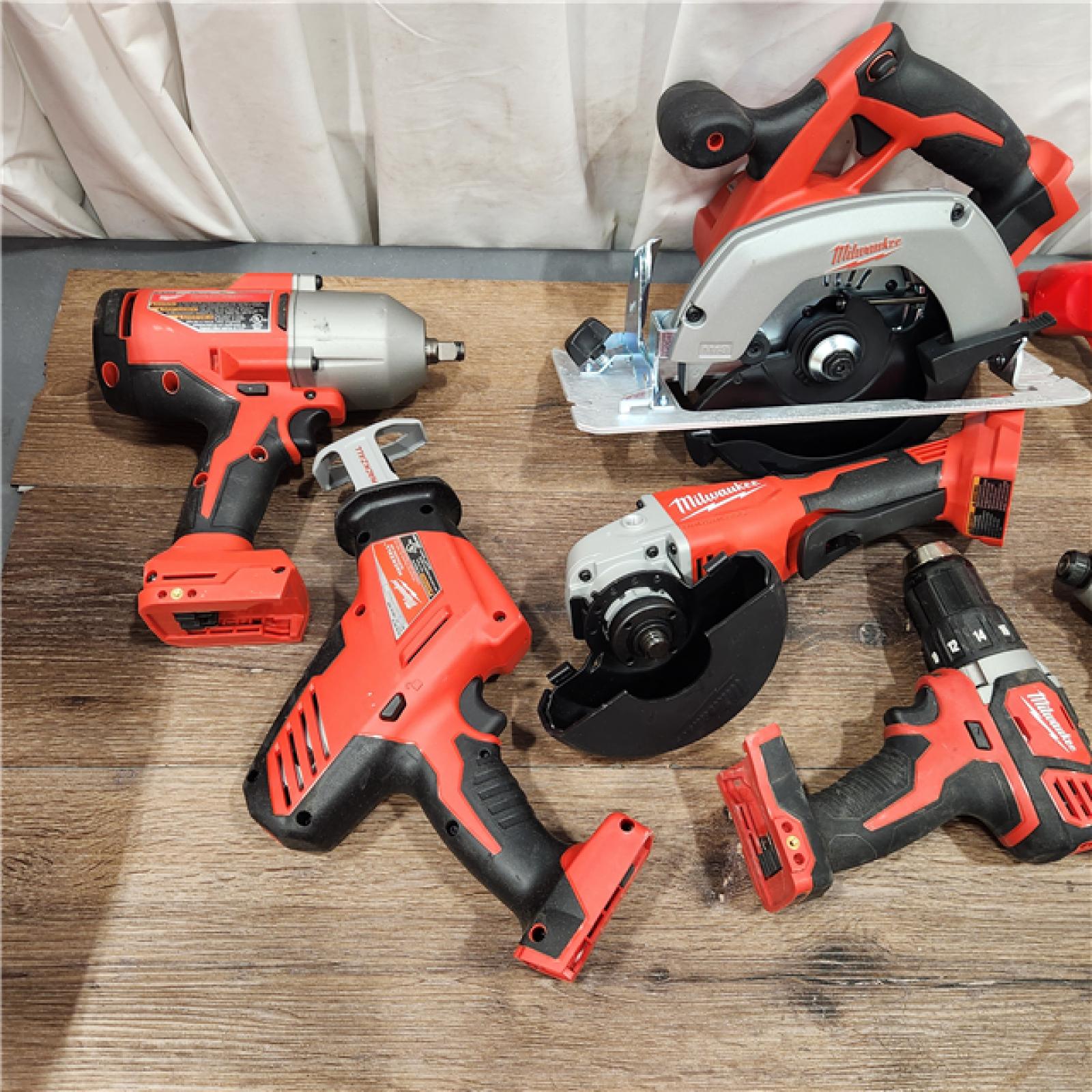 AS-IS M18 18-Volt Lithium-Ion Cordless Combo Kit (9-Tool) with (2) Batteries, Charger, and Tool Bag