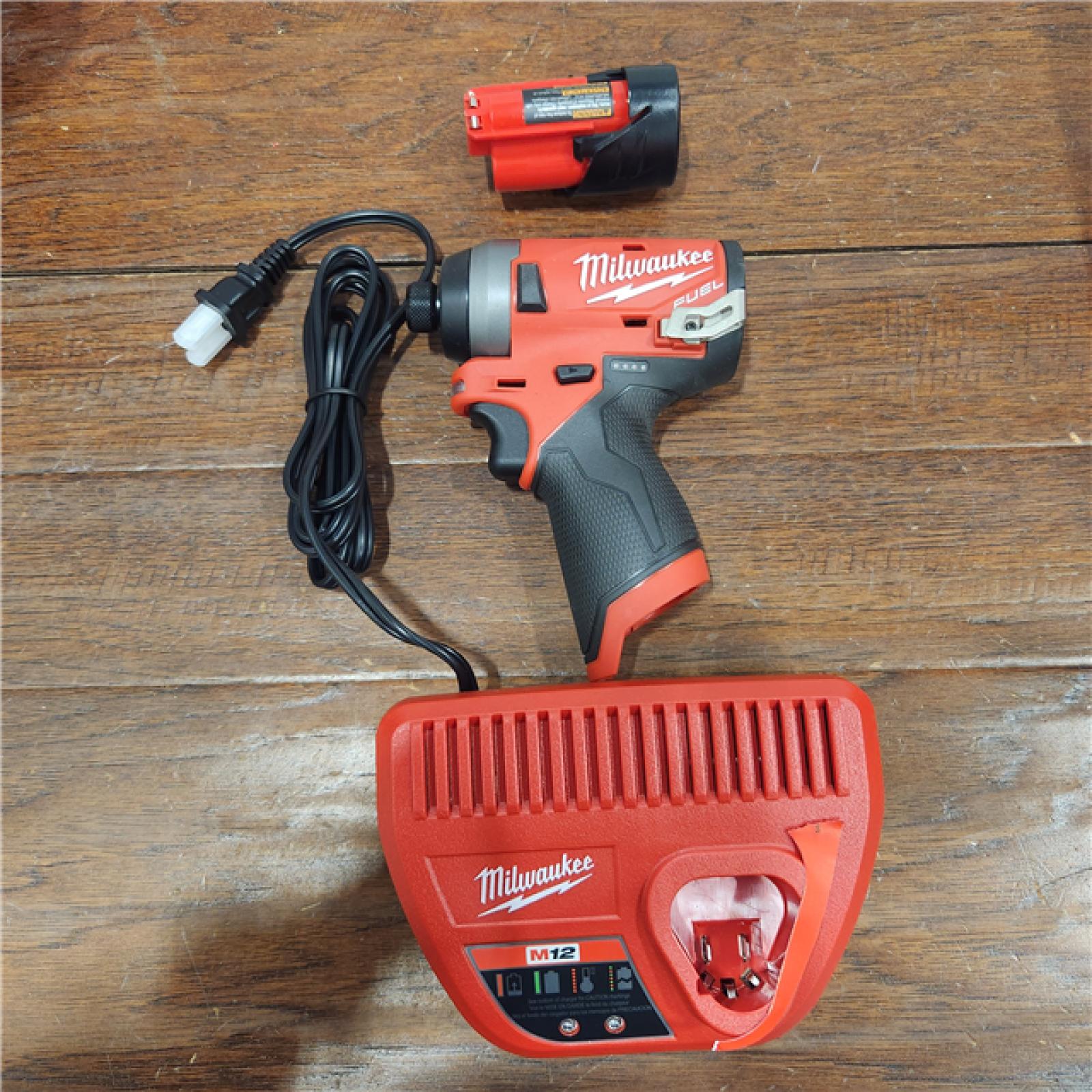 AS-IS Milwaukee M12 FUEL 12-Volt Lithium-Ion Brushless Cordless 1/4 in. Hex Impact Driver Kit with One 2.0 Ah Battery, Charger and Bag