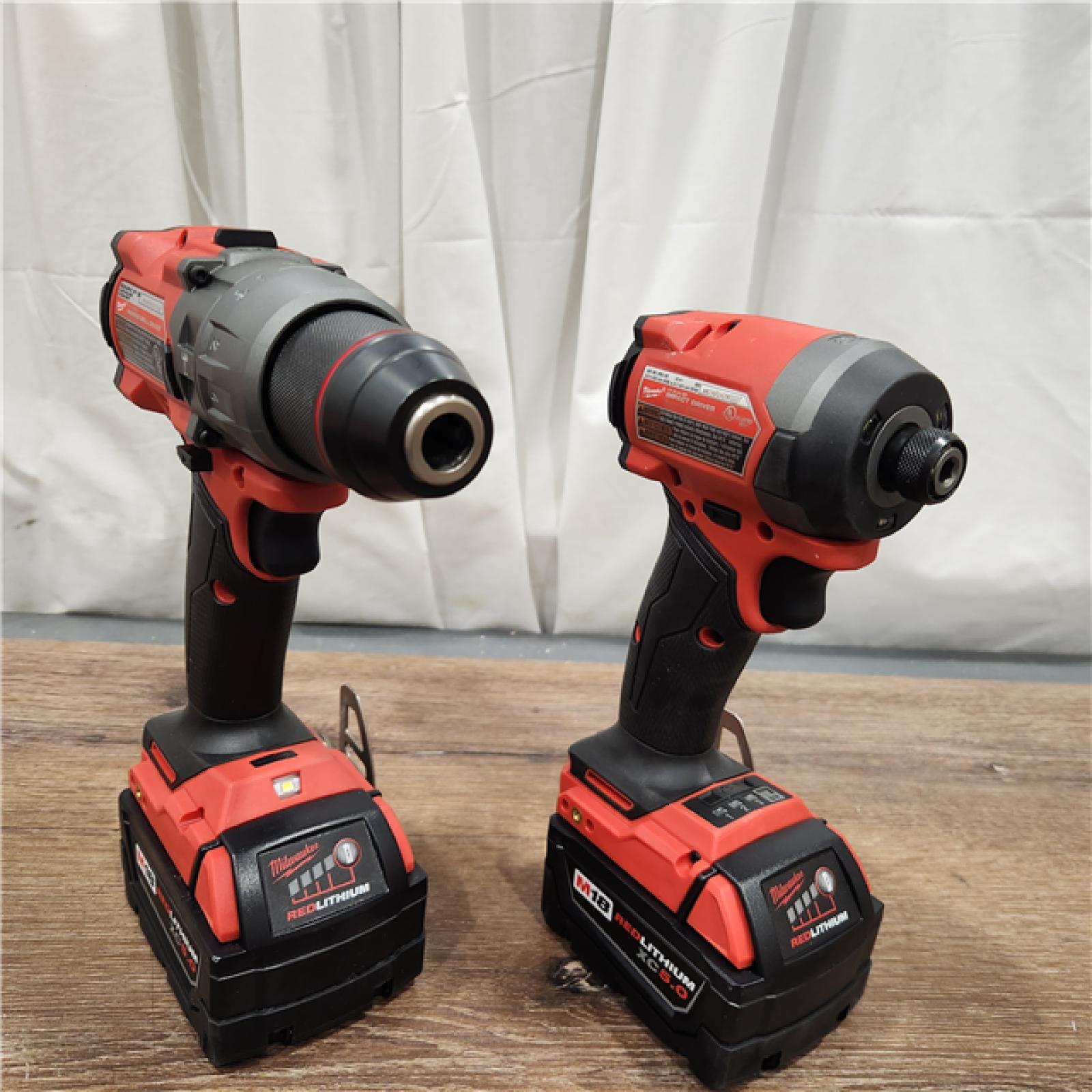 AS-IS Milwaukee M18 FUEL 18V Lithium-Ion Brushless Cordless Hammer Drill and Impact Driver Combo Kit (2-Tool) with 2 Batteries