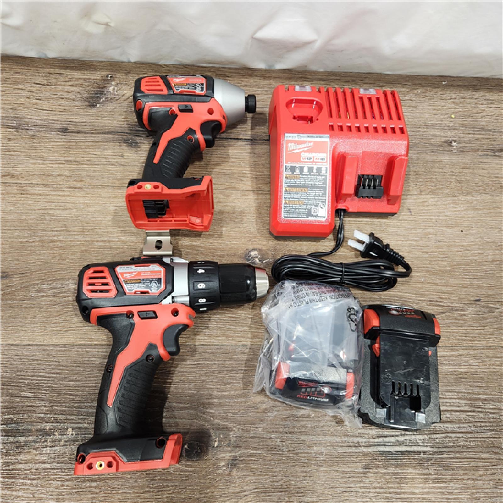 AS-IS Milwaukee M18 18V Cordless Brushed 2 Tool Drill/Driver and Impact Driver Kit