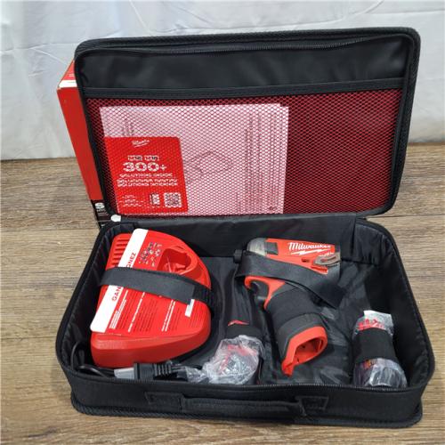 AS-IS M12 FUEL SURGE 12V Lithium-Ion Brushless Cordless 1/4 in. Hex Impact Driver Compact Kit W/Two 2.0Ah Batteries, Bag