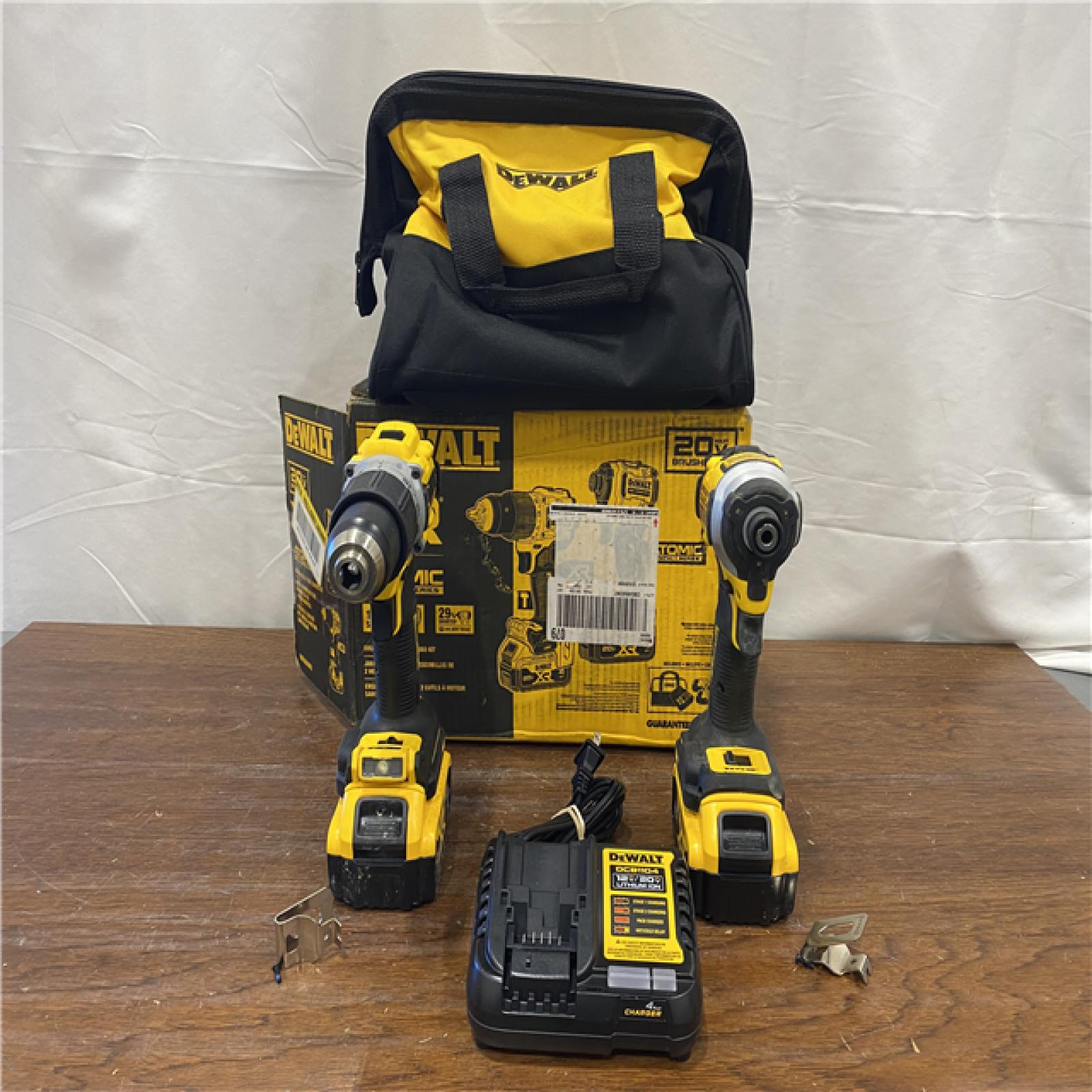 AS-IS DEWALT 20V MAX XR Hammer Drill and ATOMIC Impact Driver 2 Tool Cordless Combo Kit with (2) 4.0Ah Batteries, Charger, and Bag