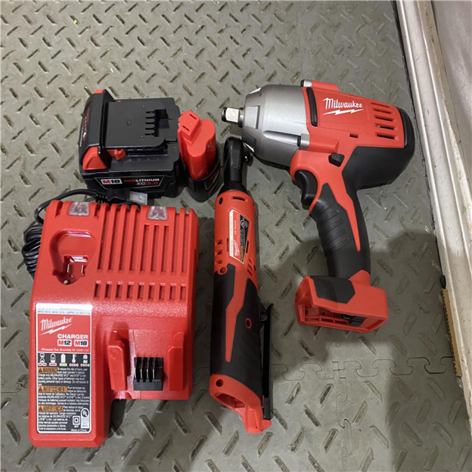 Houston location AS-IS MILWAUKEE M18/M12 12/18V Lithium-Ion Cordless 3/8 in. Ratchet and 1/2 in. Impact Wrench with Friction Ring Combo Kit