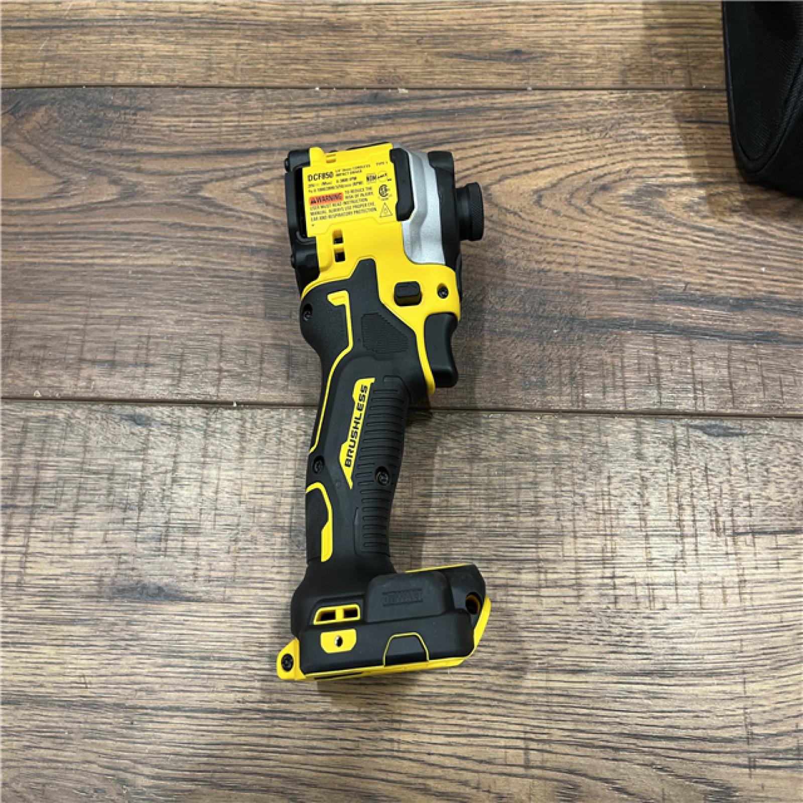 AS-IS DEWALT ATOMIC 20V MAX Lithium-Ion Cordless 1/4 in. Brushless Impact Driver Kit, 5 Ah Battery, Charger, and Bag ( NO BATTERY )